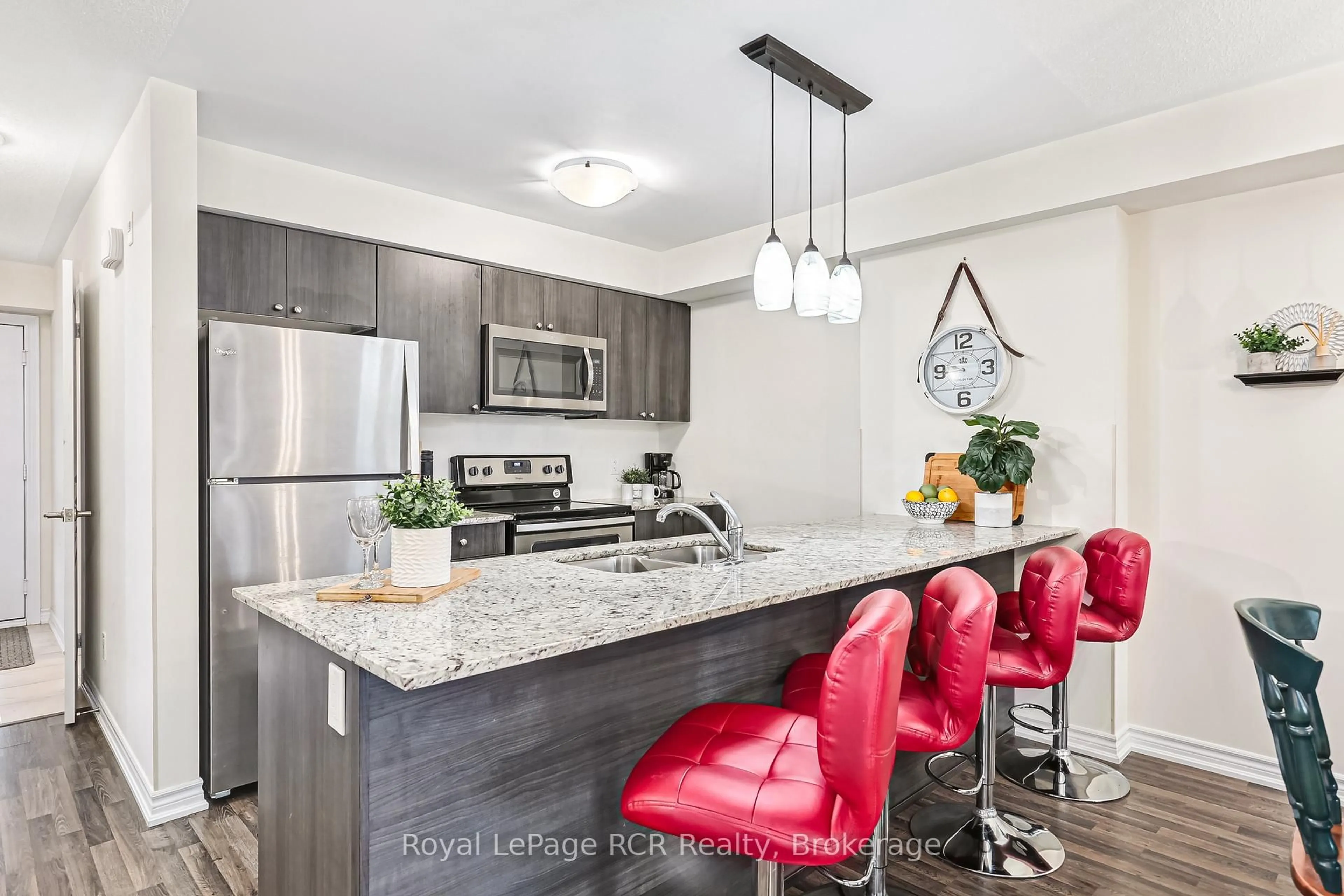 Open concept kitchen, unknown for 2 COVE Crt #205, Collingwood Ontario L9Y 0Y6