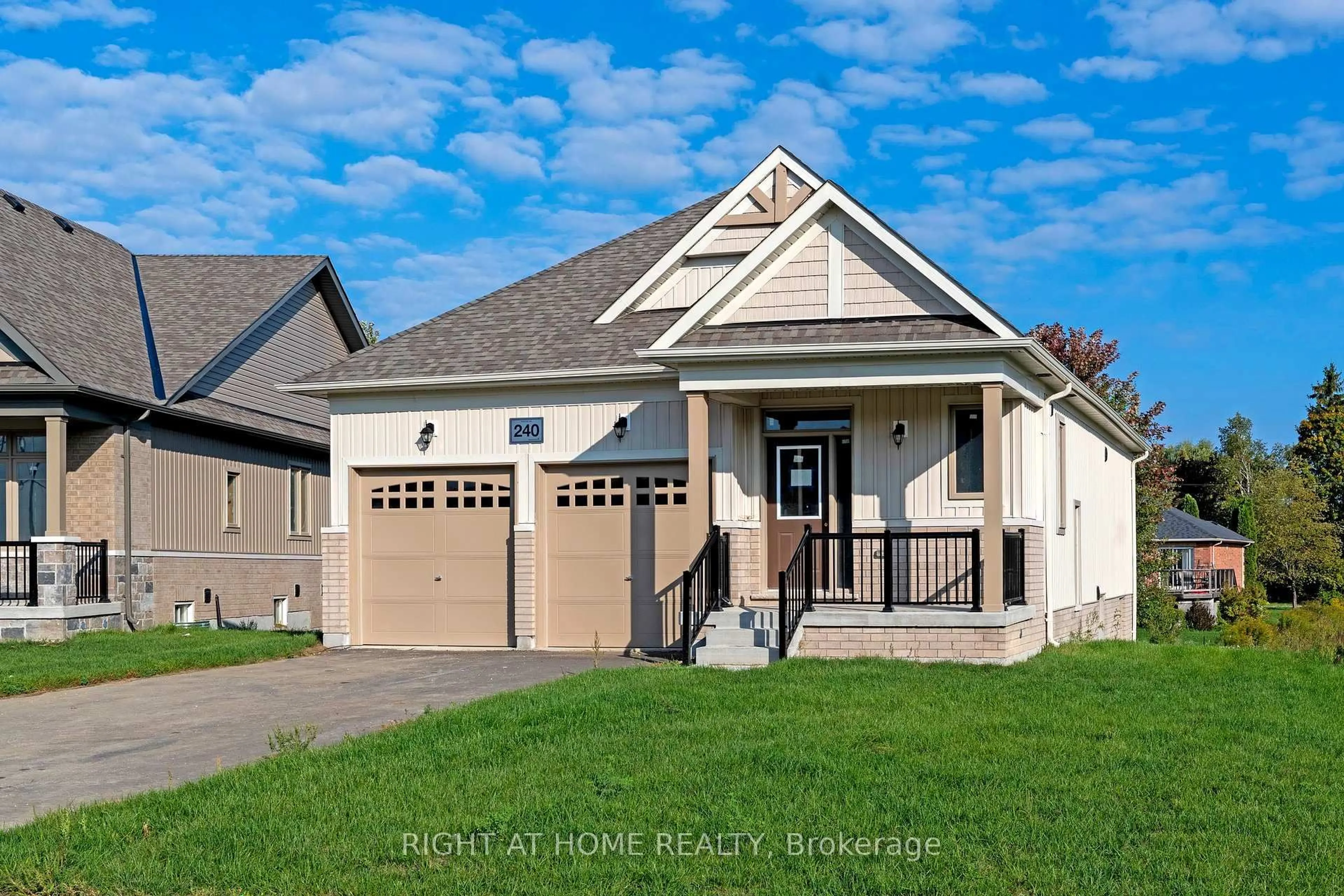 Home with vinyl exterior material, street for 240 Wilcox Dr, Clearview Ontario L0M 1S0