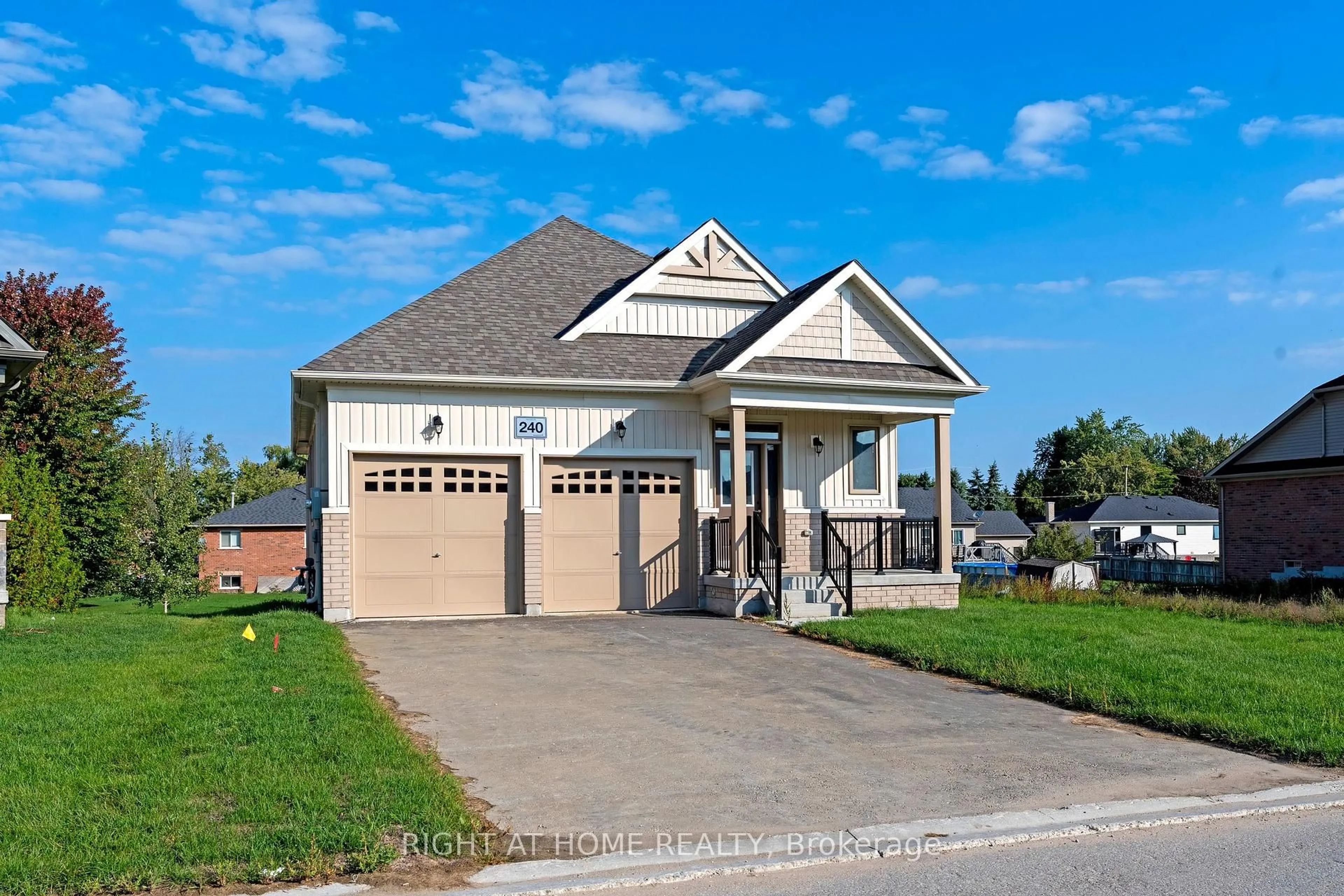 Home with vinyl exterior material, street for 240 Wilcox Dr, Clearview Ontario L0M 1S0