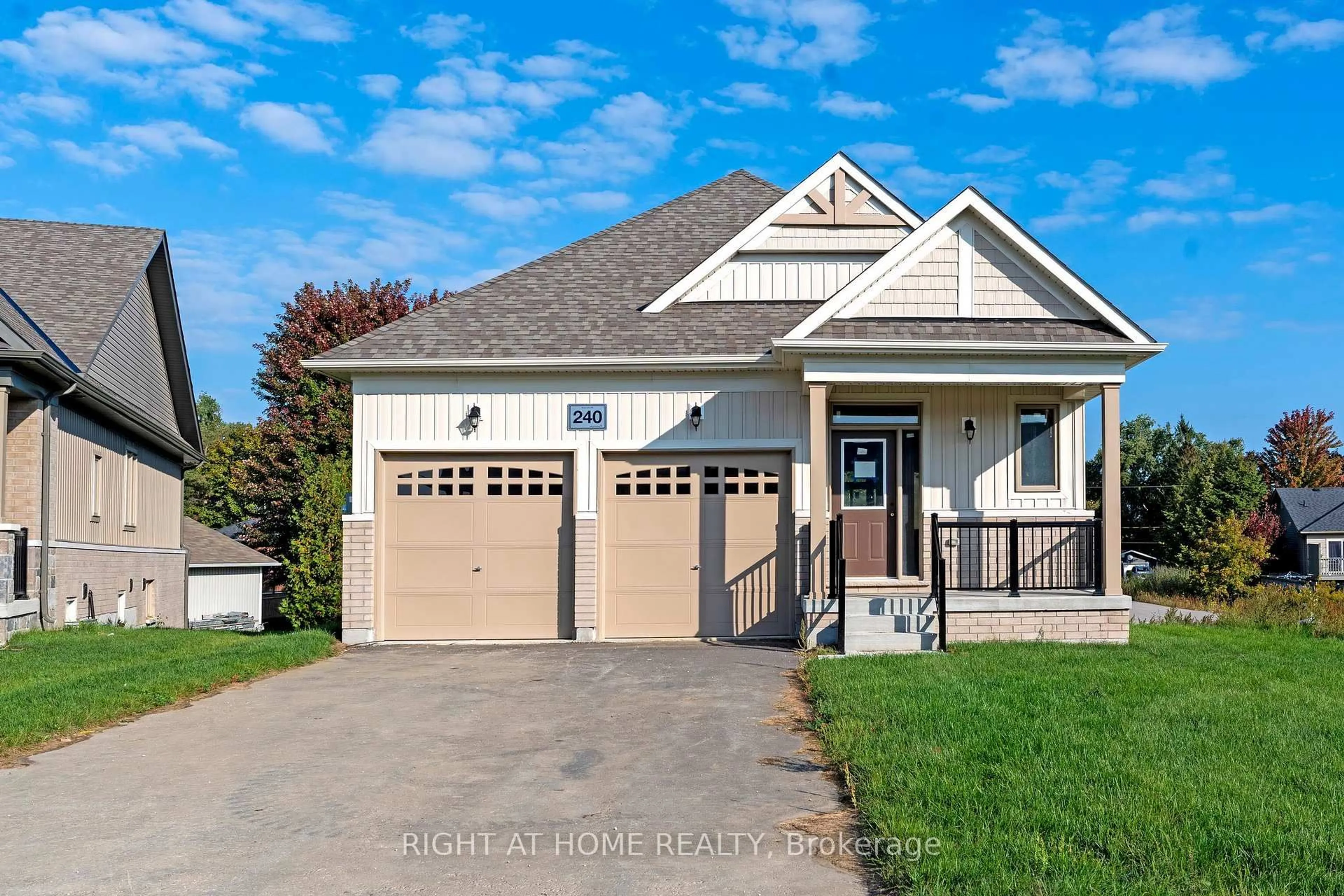 Home with vinyl exterior material, street for 240 Wilcox Dr, Clearview Ontario L0M 1S0