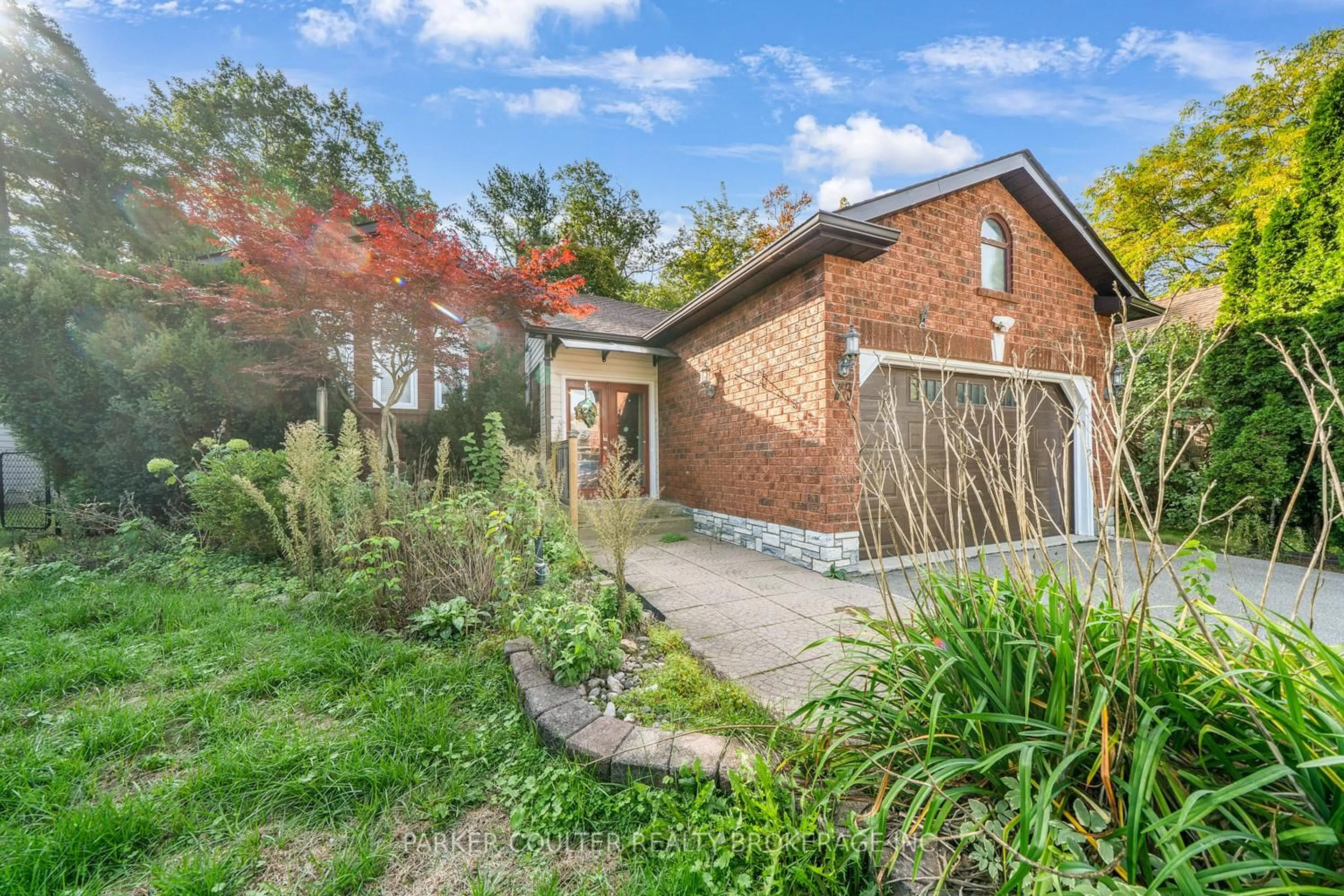 Home with brick exterior material, street for 73 Timberland Cres, Wasaga Beach Ontario L9Z 1G9