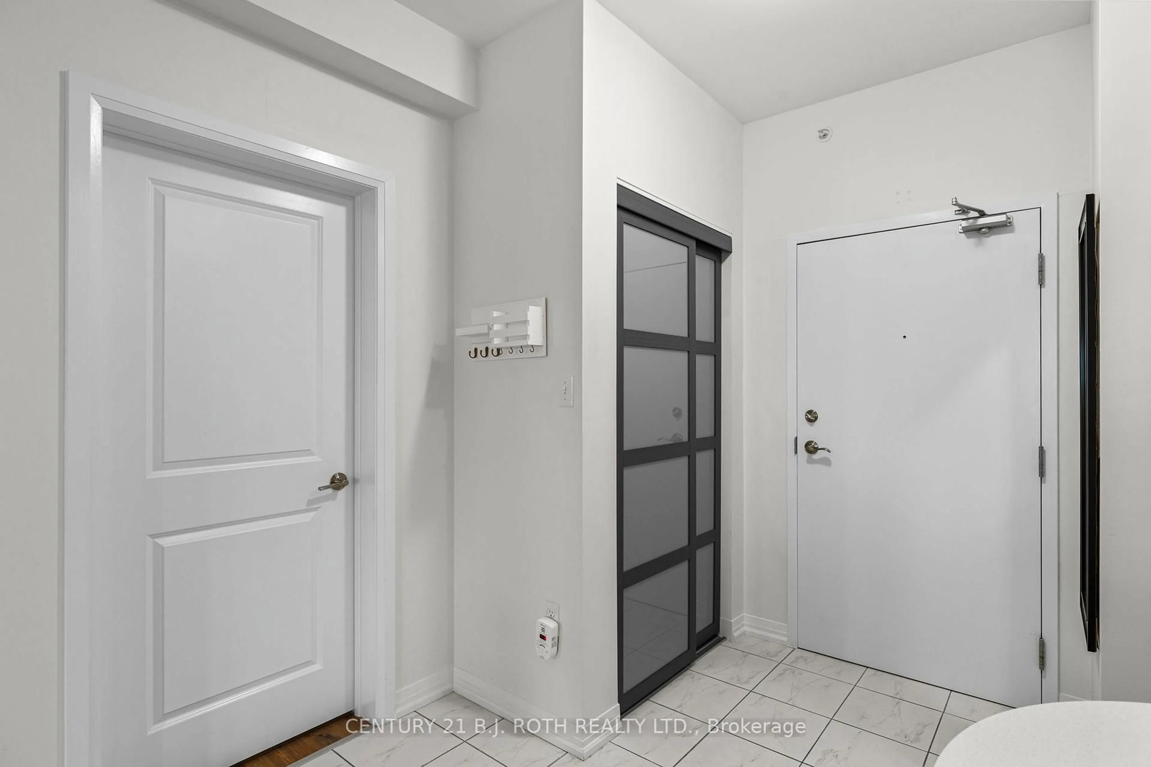 Indoor entryway for 300 ESSA Rd #204, Barrie Ontario L9J 0B9