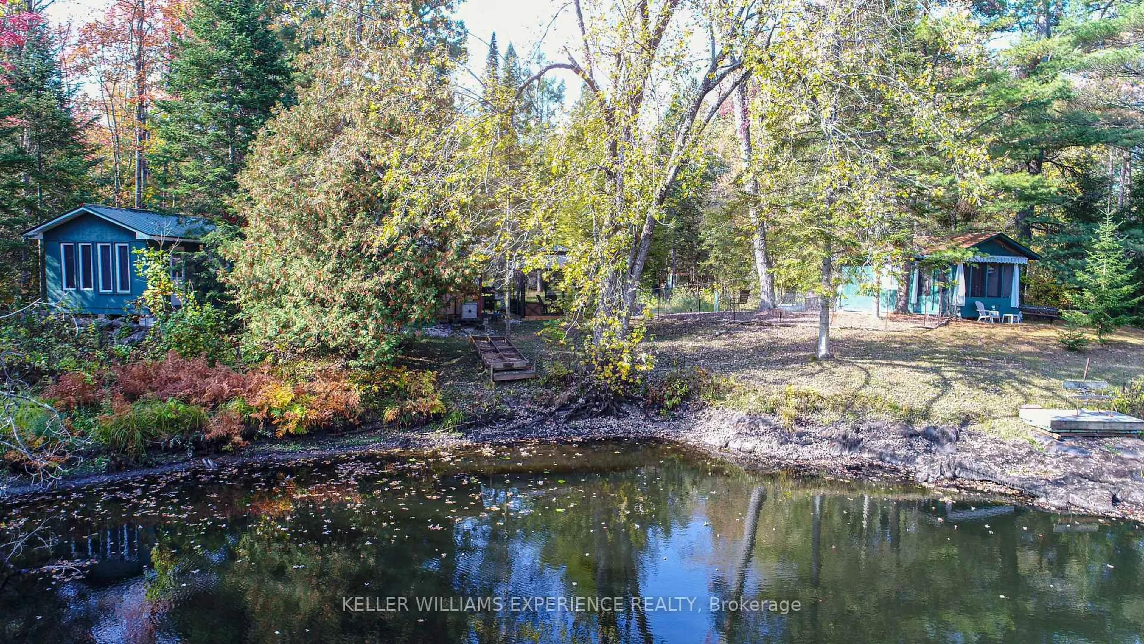A pic from outside/outdoor area/front of a property/back of a property/a pic from drone, water/lake/river/ocean view for 6519 Pioneer Village Lane, Ramara Ontario L0K 1W0