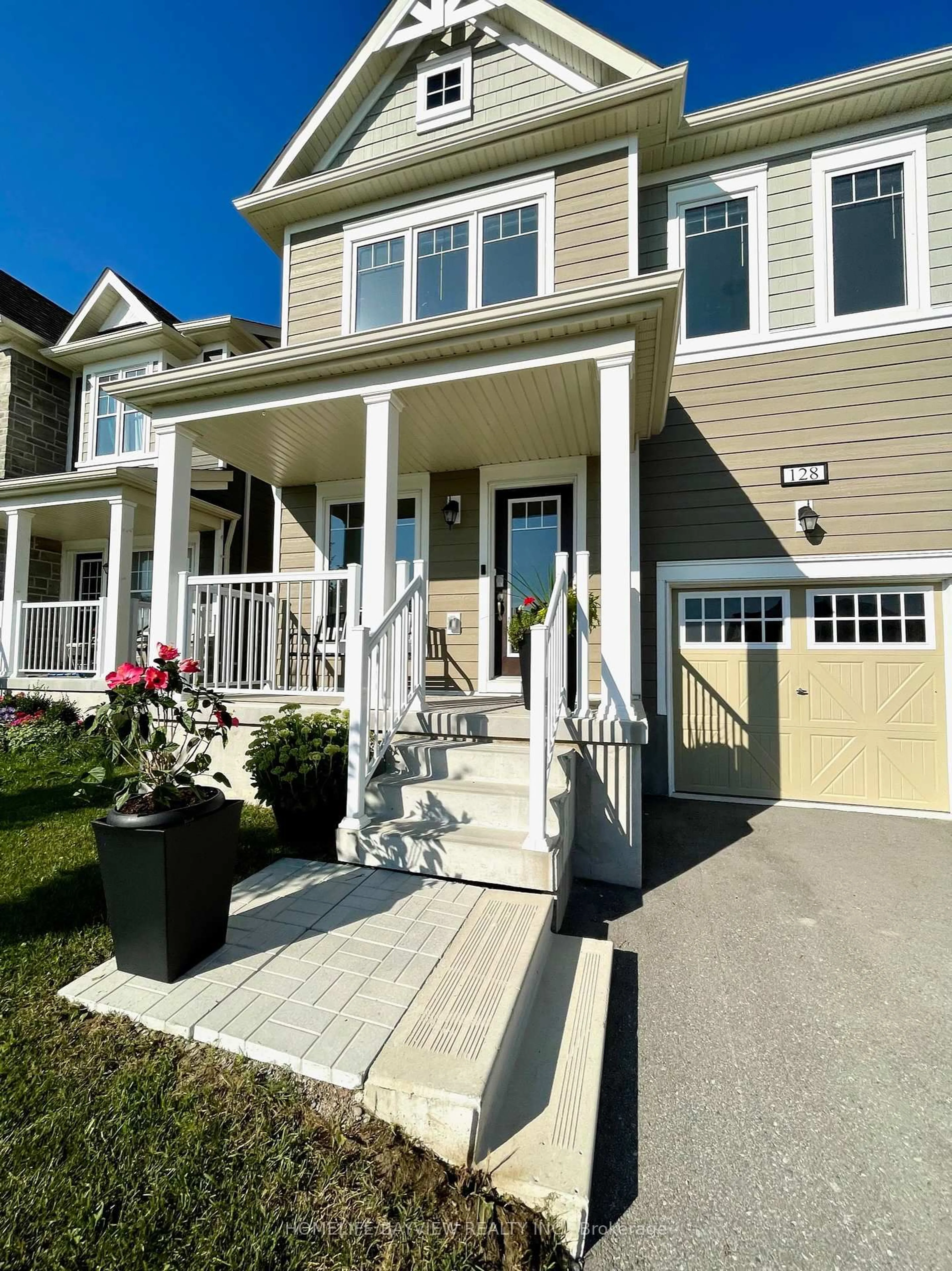 Home with vinyl exterior material, street for 128 Village Gate Dr, Wasaga Beach Ontario L9Z 0J7