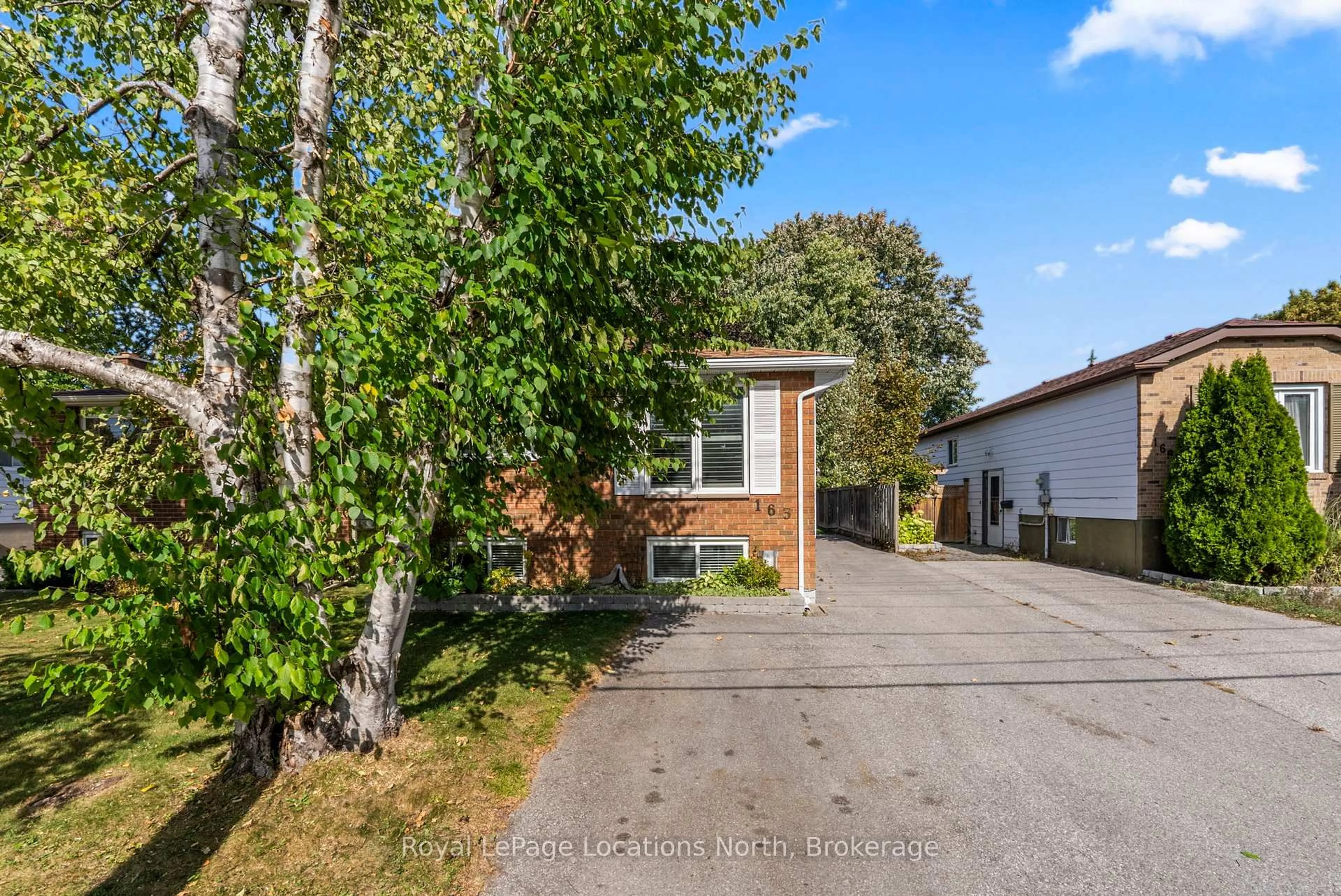 Home with brick exterior material, street for 163 Collins St, Collingwood Ontario L9Y 4L7