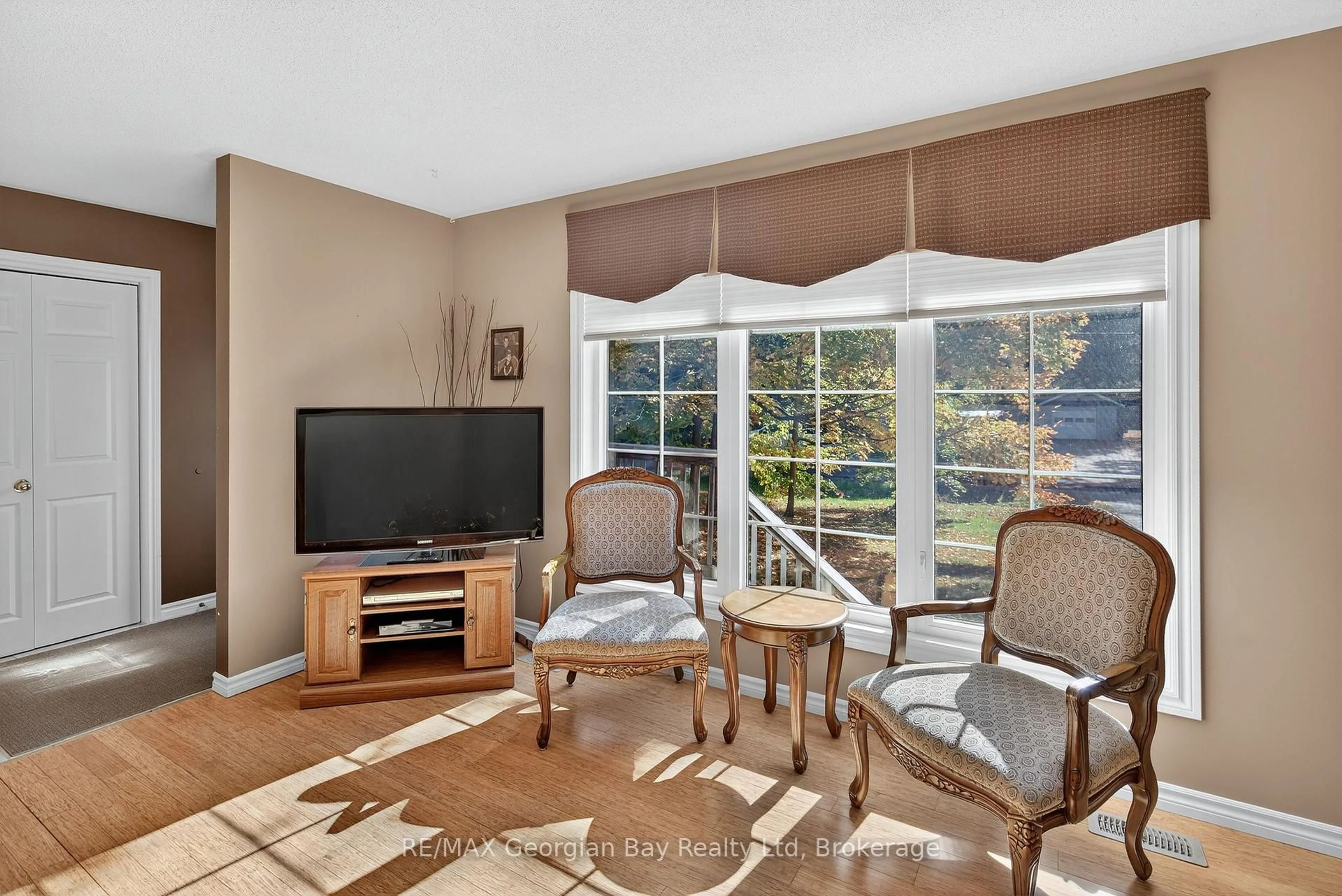 Living room with furniture, unknown for 56 Becketts Side Rd, Tay Ontario L0K 2C0