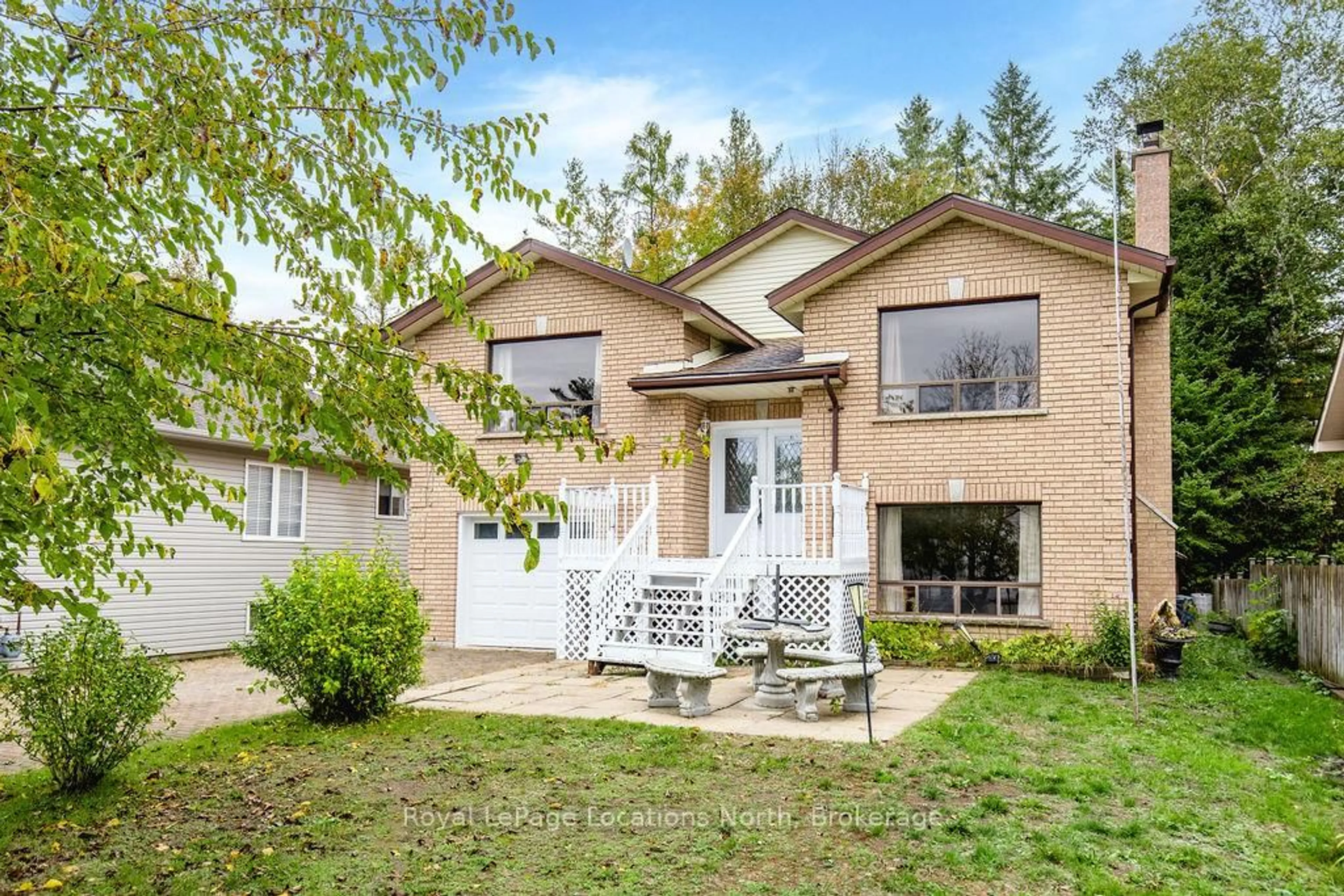 Home with brick exterior material, street for 3 51st St, Wasaga Beach Ontario L9Z 1X5
