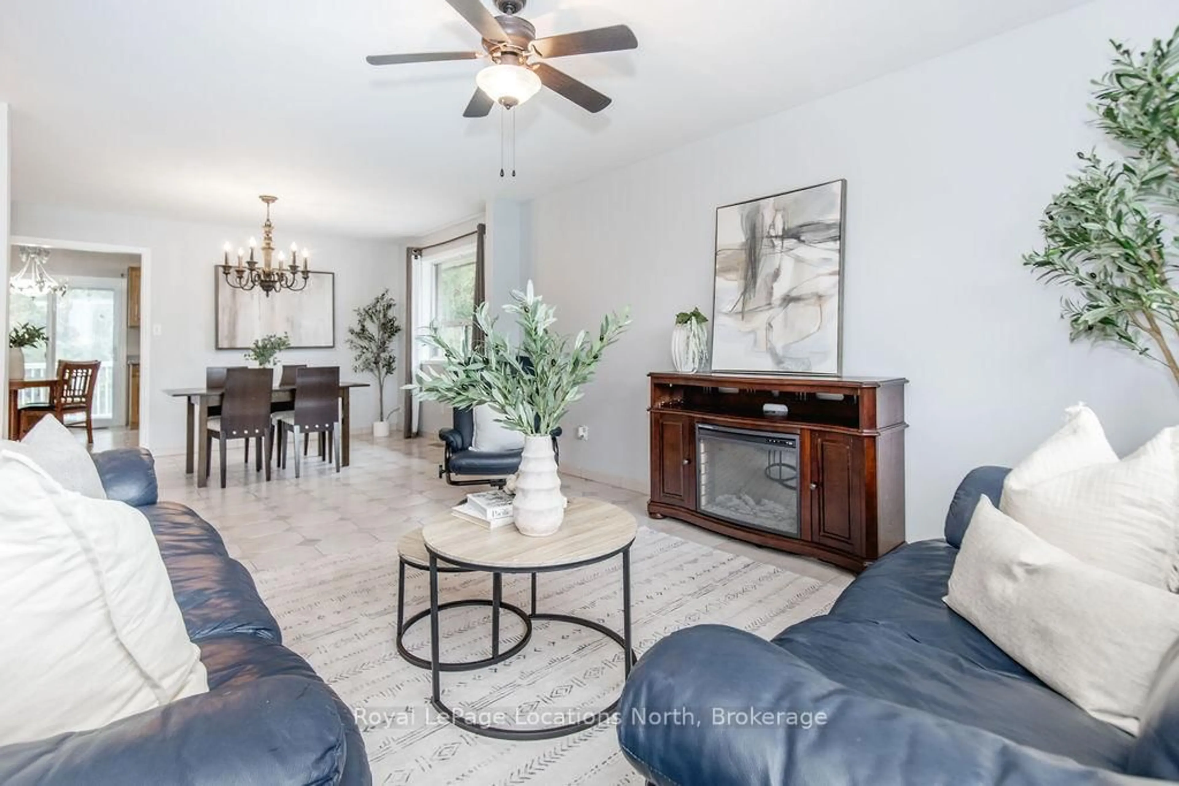 Living room with furniture, ceramic/tile floor for 3 51st St, Wasaga Beach Ontario L9Z 1X5