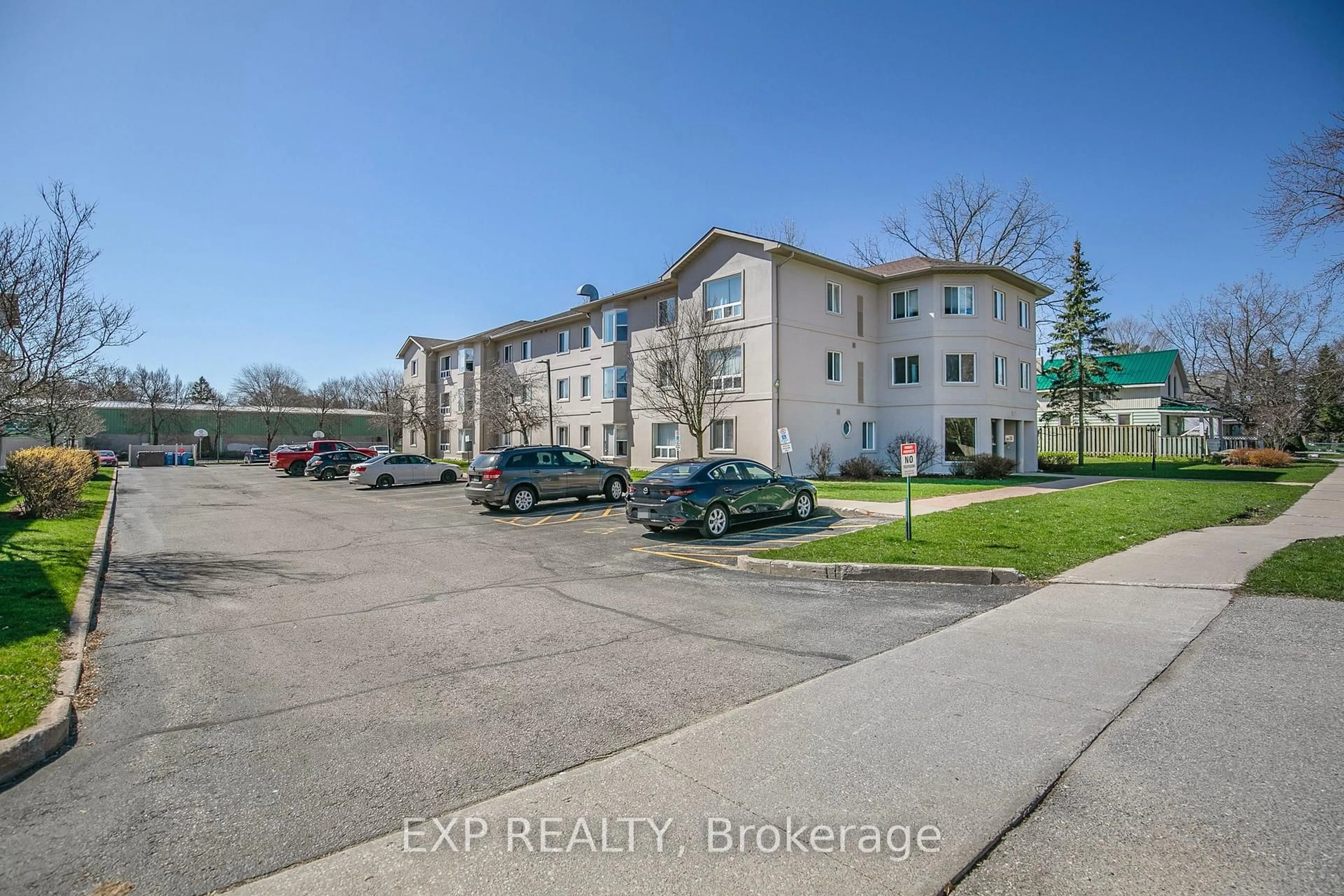 A pic from outside/outdoor area/front of a property/back of a property/a pic from drone, street for 107 Bond St #303, Orillia Ontario L3V 1J7