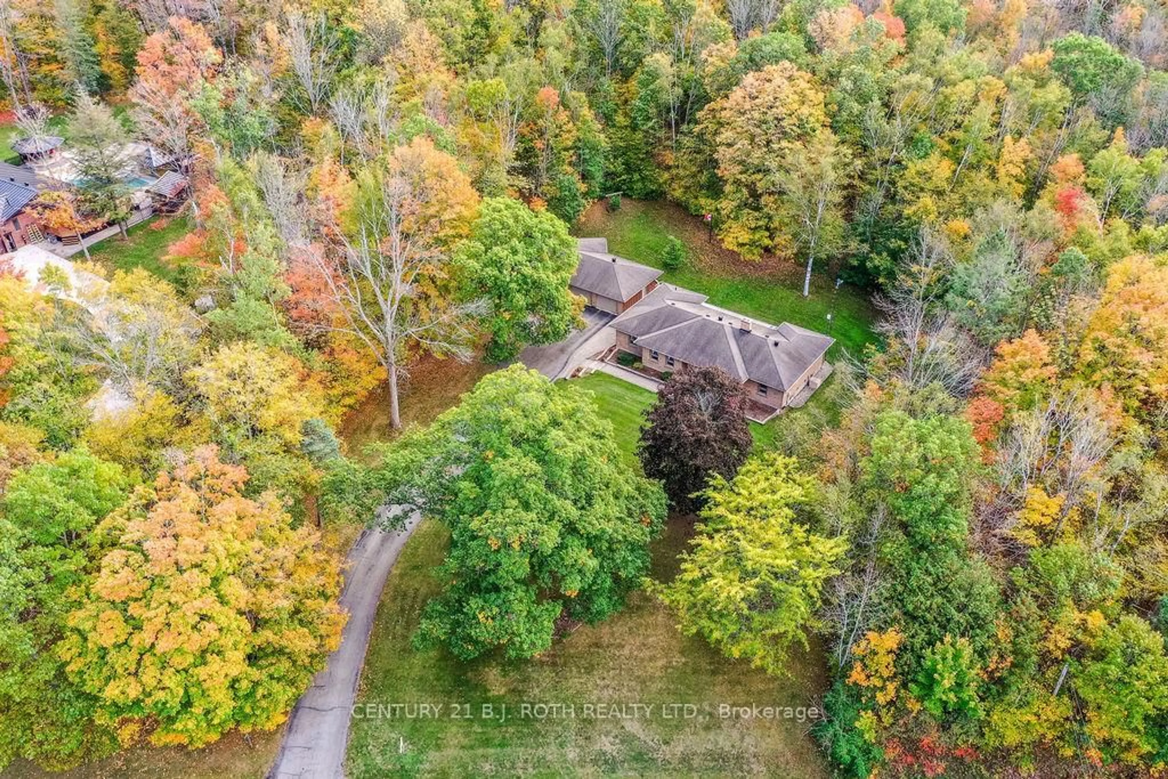A pic from outside/outdoor area/front of a property/back of a property/a pic from drone, forest/trees view for 1059 Birchcliffe Cres, Severn Ontario L3V 0W1