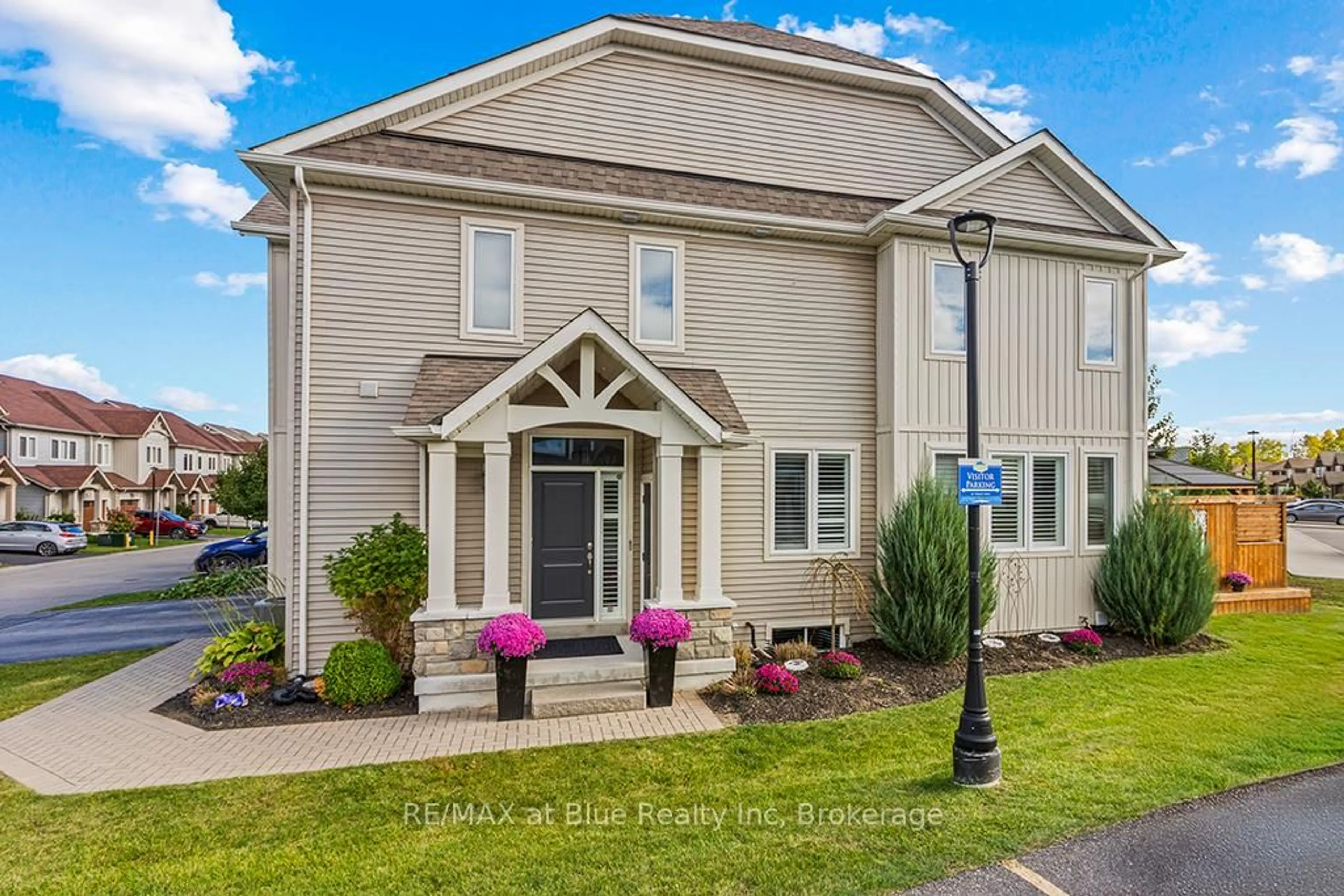 Home with vinyl exterior material, street for 48 Lett Ave, Collingwood Ontario L9Y 0Z5