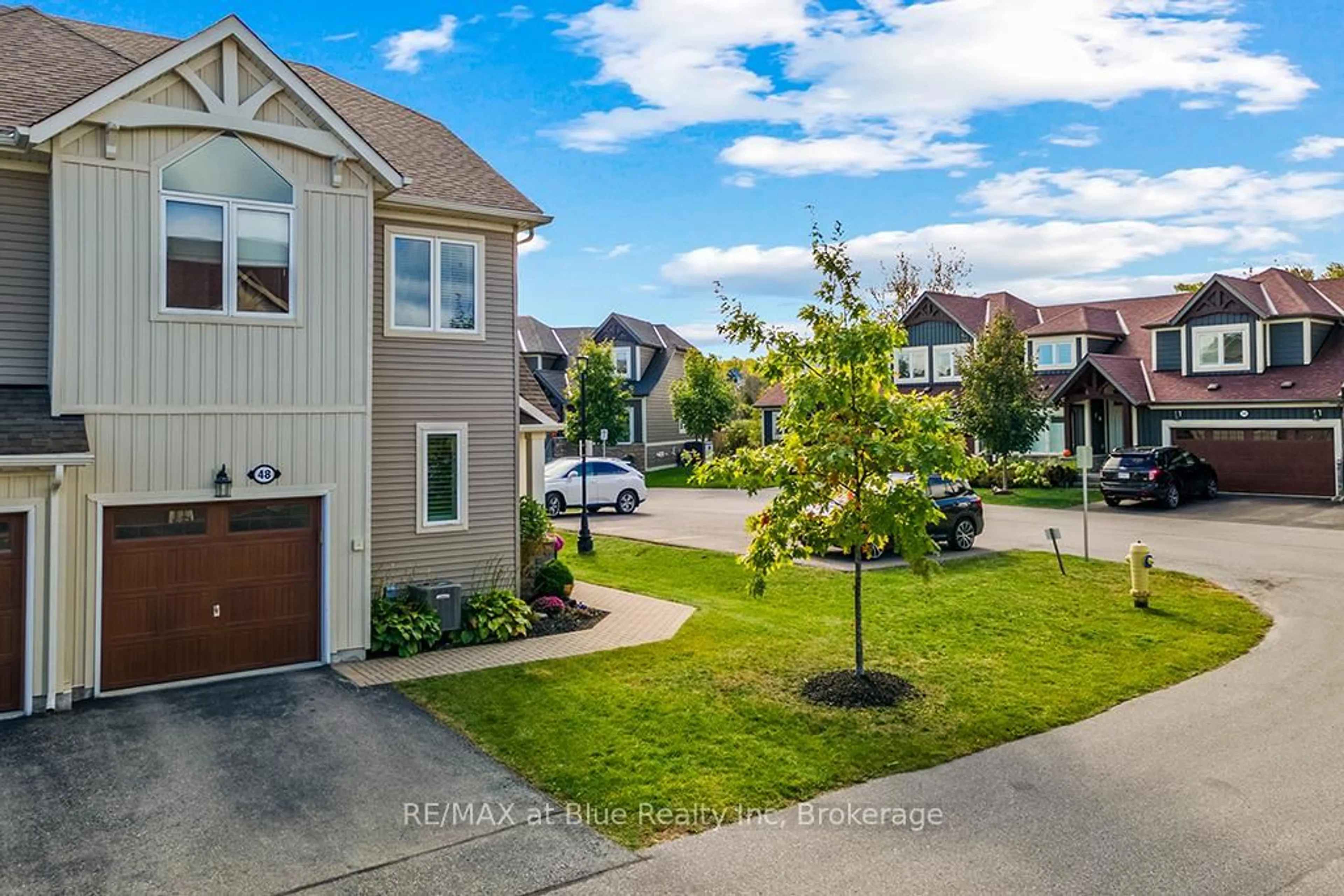 A pic from outside/outdoor area/front of a property/back of a property/a pic from drone, street for 48 Lett Ave, Collingwood Ontario L9Y 0Z5