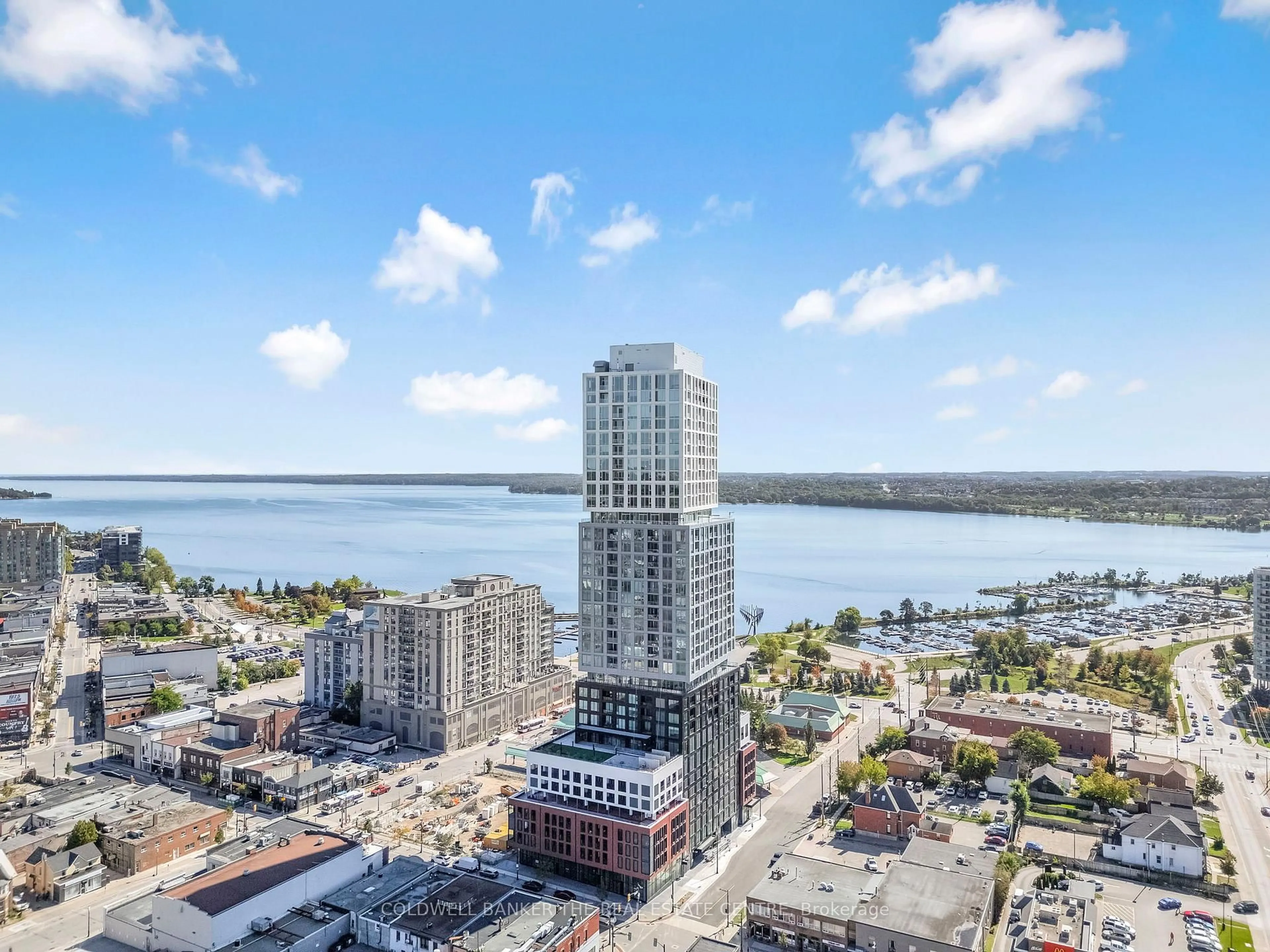 A pic from outside/outdoor area/front of a property/back of a property/a pic from drone, water/lake/river/ocean view for 55 Dunlop St, Barrie Ontario L4L 1A3