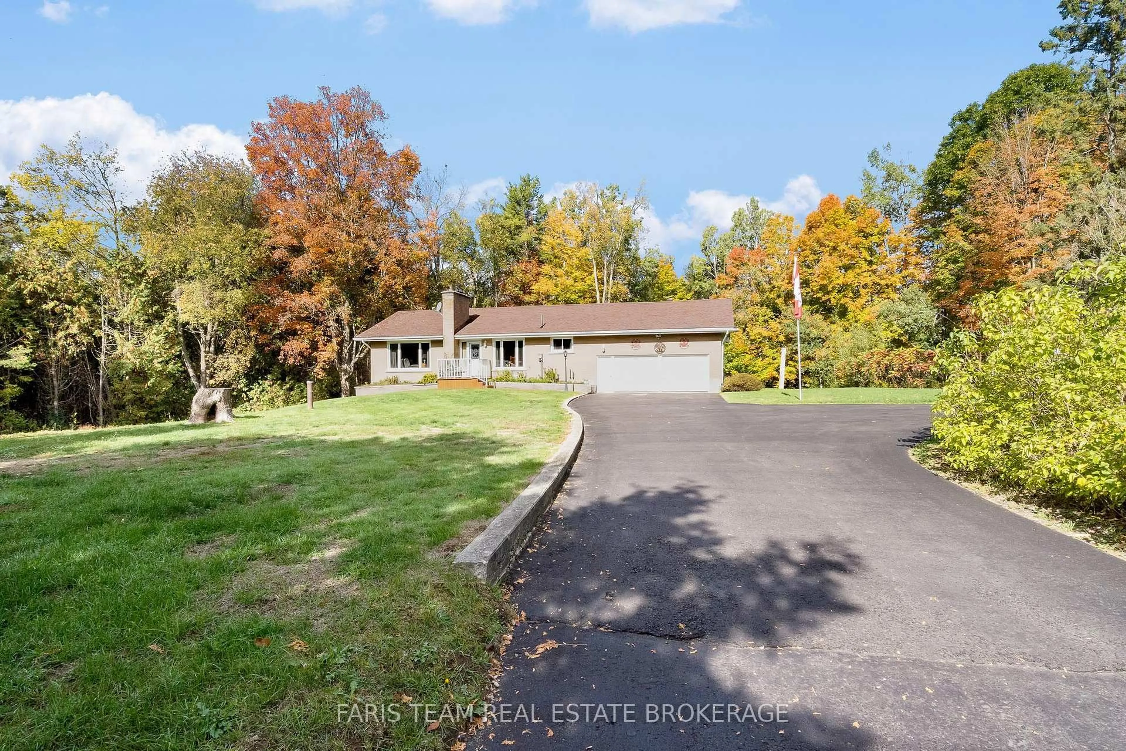 A pic from outside/outdoor area/front of a property/back of a property/a pic from drone, unknown for 2826 Horseshoe Valley Rd, Springwater Ontario L0L 2K0