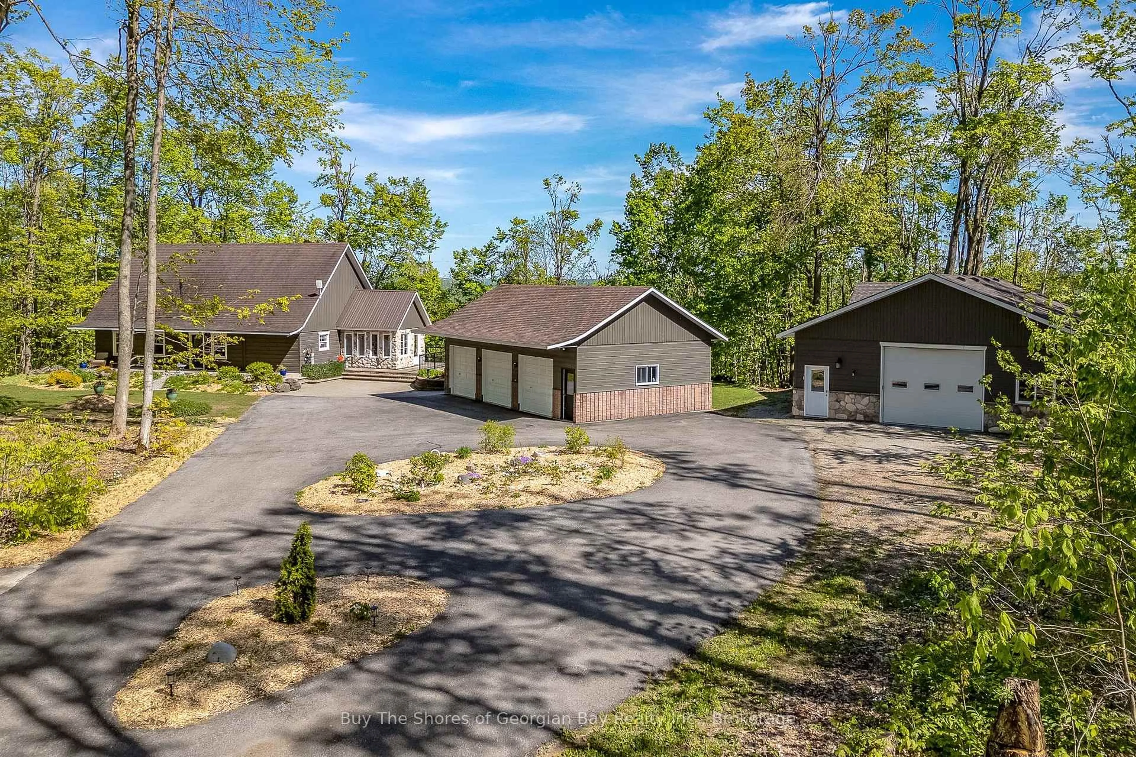A pic from outside/outdoor area/front of a property/back of a property/a pic from drone, unknown for 691 Mount St. Louis Rd, Oro-Medonte Ontario L0L 1V0