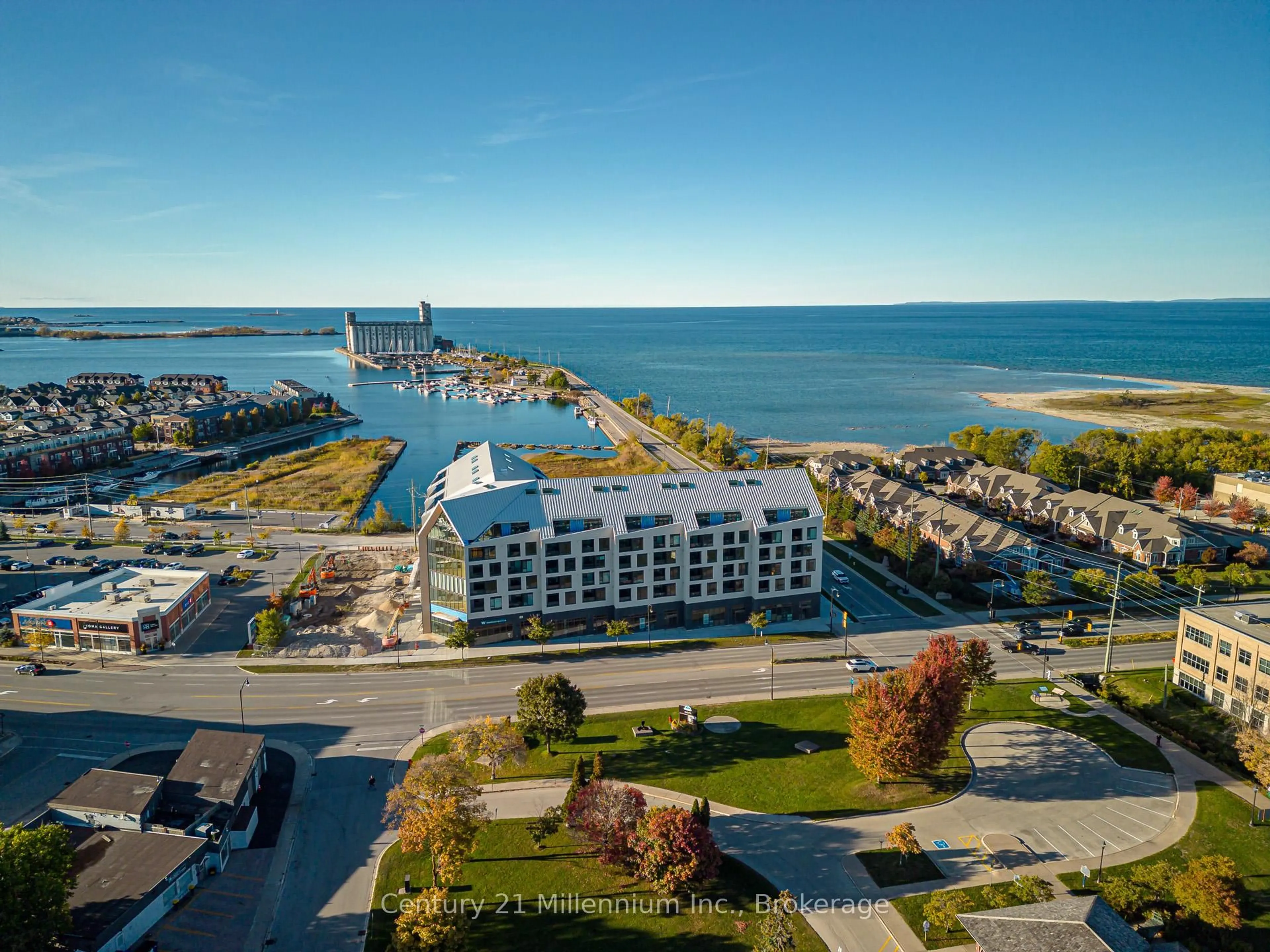 A pic from outside/outdoor area/front of a property/back of a property/a pic from drone, water/lake/river/ocean view for 31 Huron St #223, Collingwood Ontario L9Y 5T7