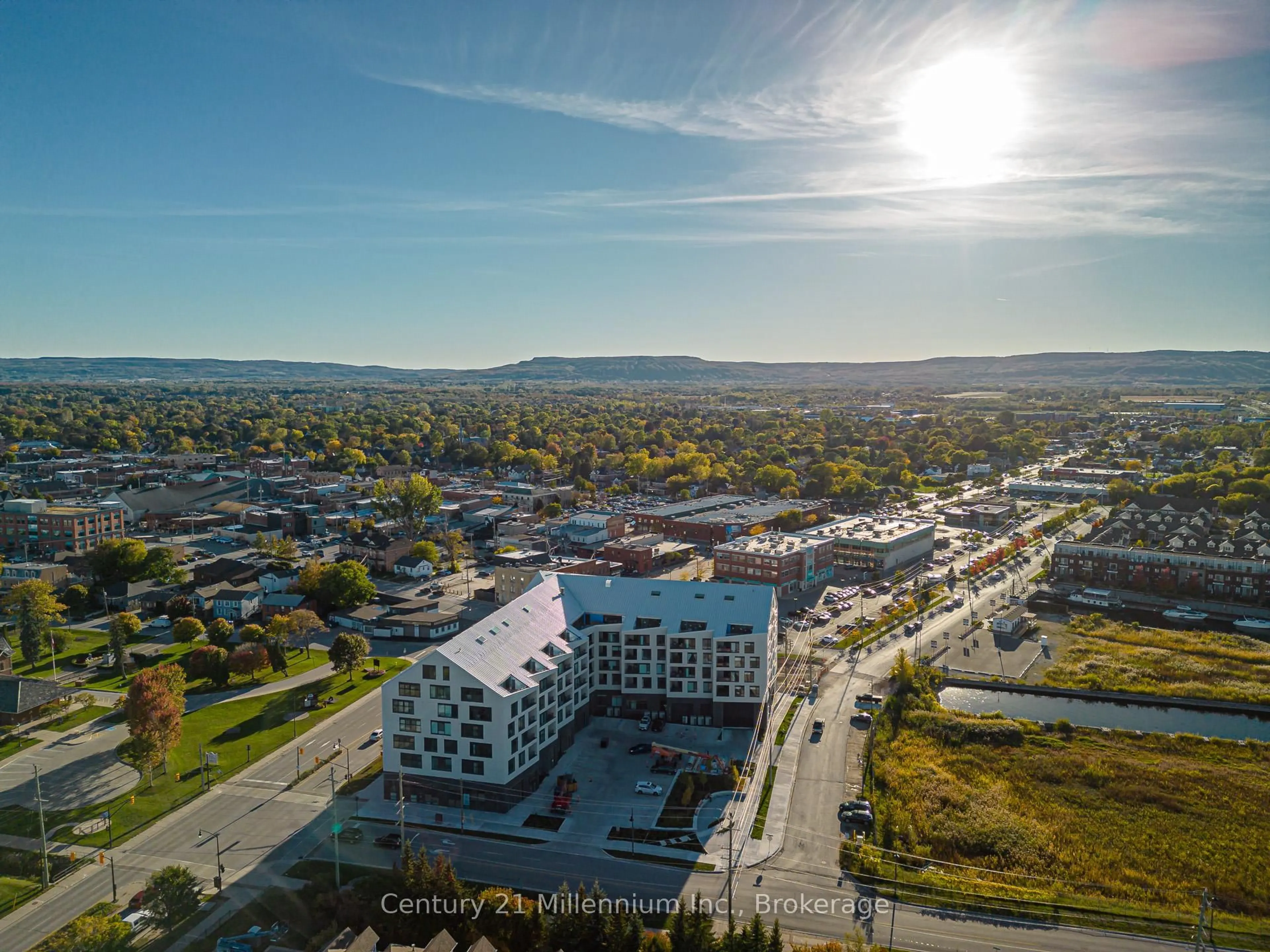 A pic from outside/outdoor area/front of a property/back of a property/a pic from drone, city buildings view from balcony for 31 Huron St #223, Collingwood Ontario L9Y 5T7