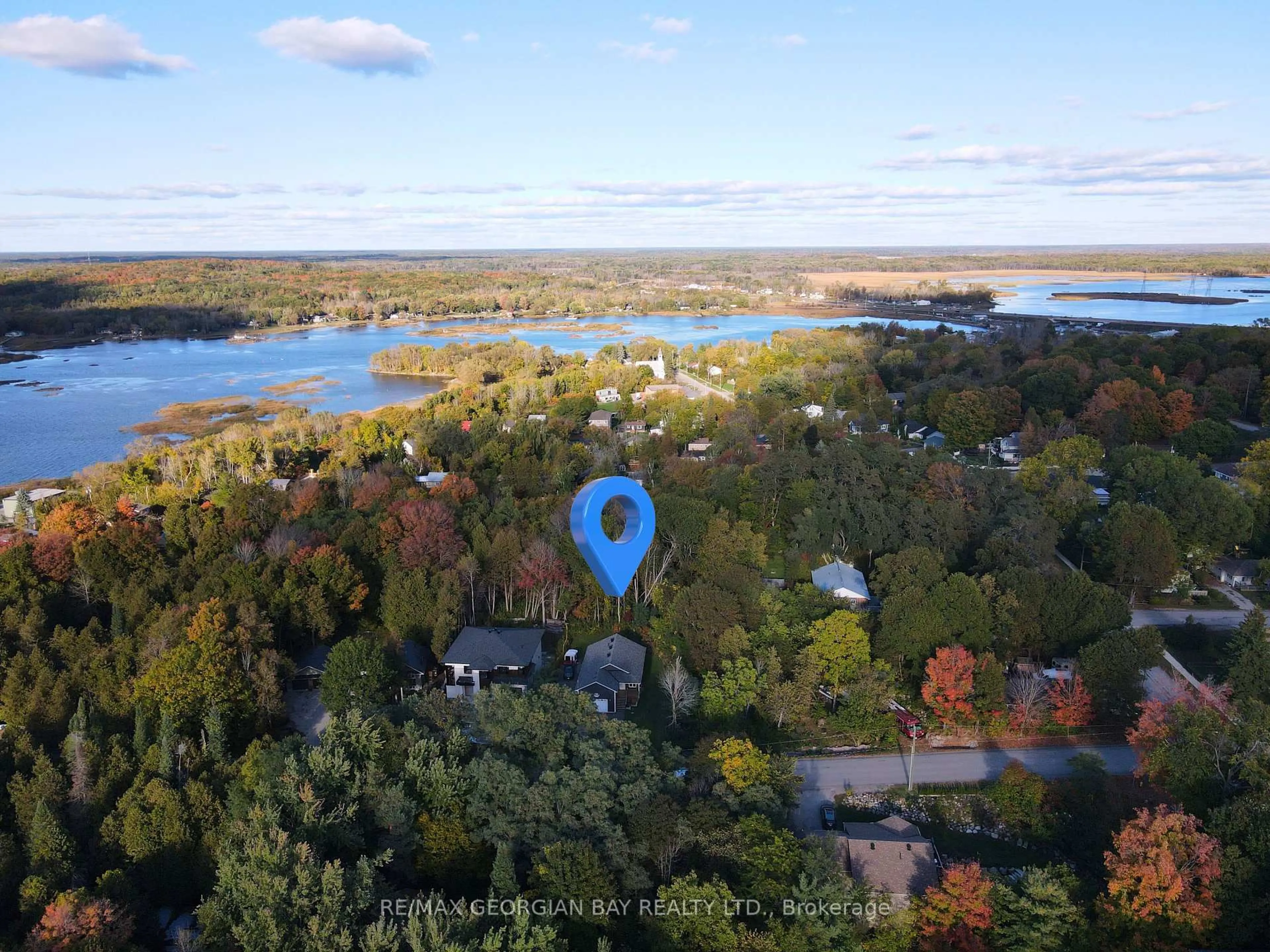 A pic from outside/outdoor area/front of a property/back of a property/a pic from drone, water/lake/river/ocean view for 10 King Rd, Tay Ontario L0K 2C0
