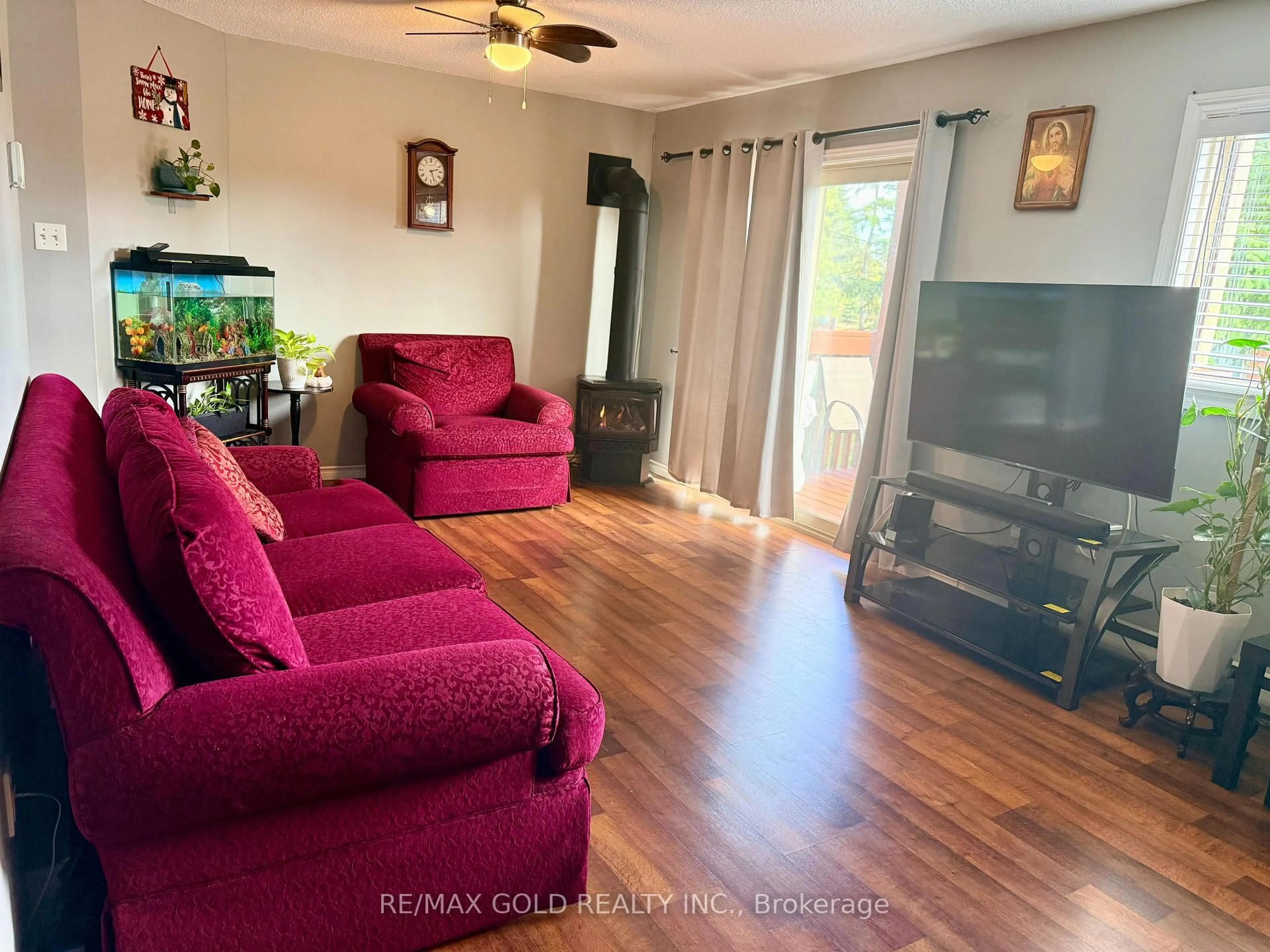 Living room with furniture, wood/laminate floor for 9 Meadow Lane #2, Barrie Ontario L4N 6Z1