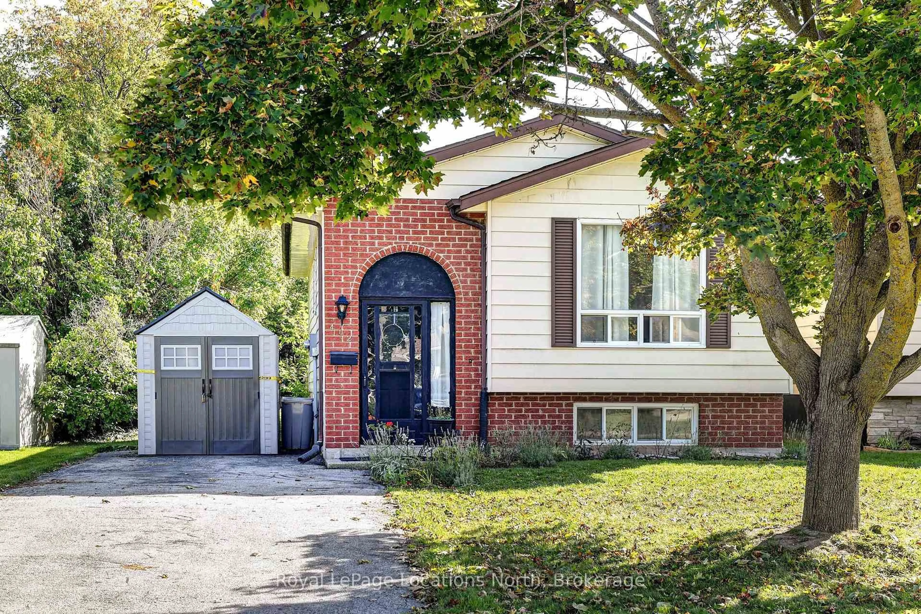 Home with brick exterior material, street for 402 SEVENTH St, Collingwood Ontario L9Y 2B5