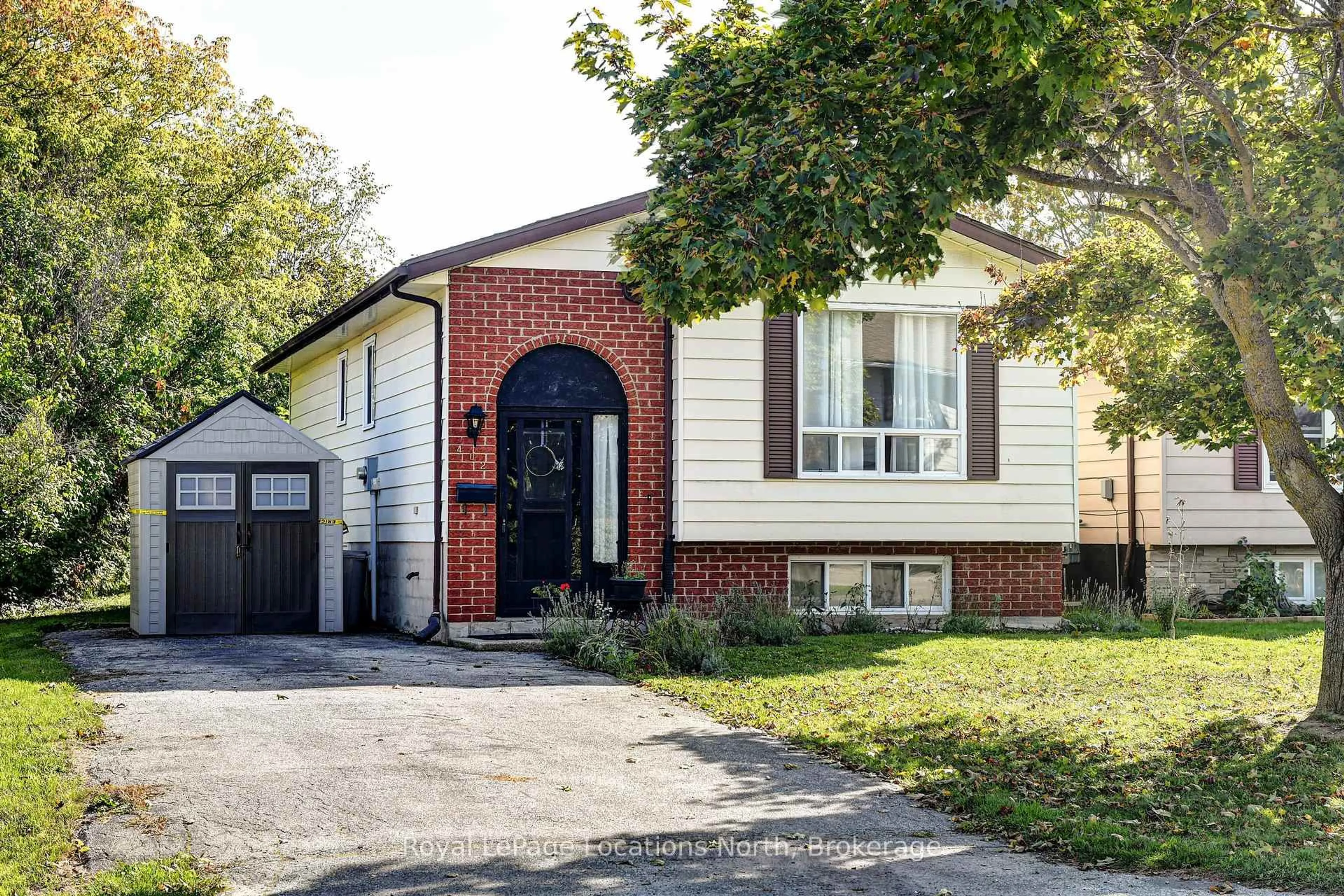 Home with brick exterior material, street for 402 SEVENTH St, Collingwood Ontario L9Y 2B5