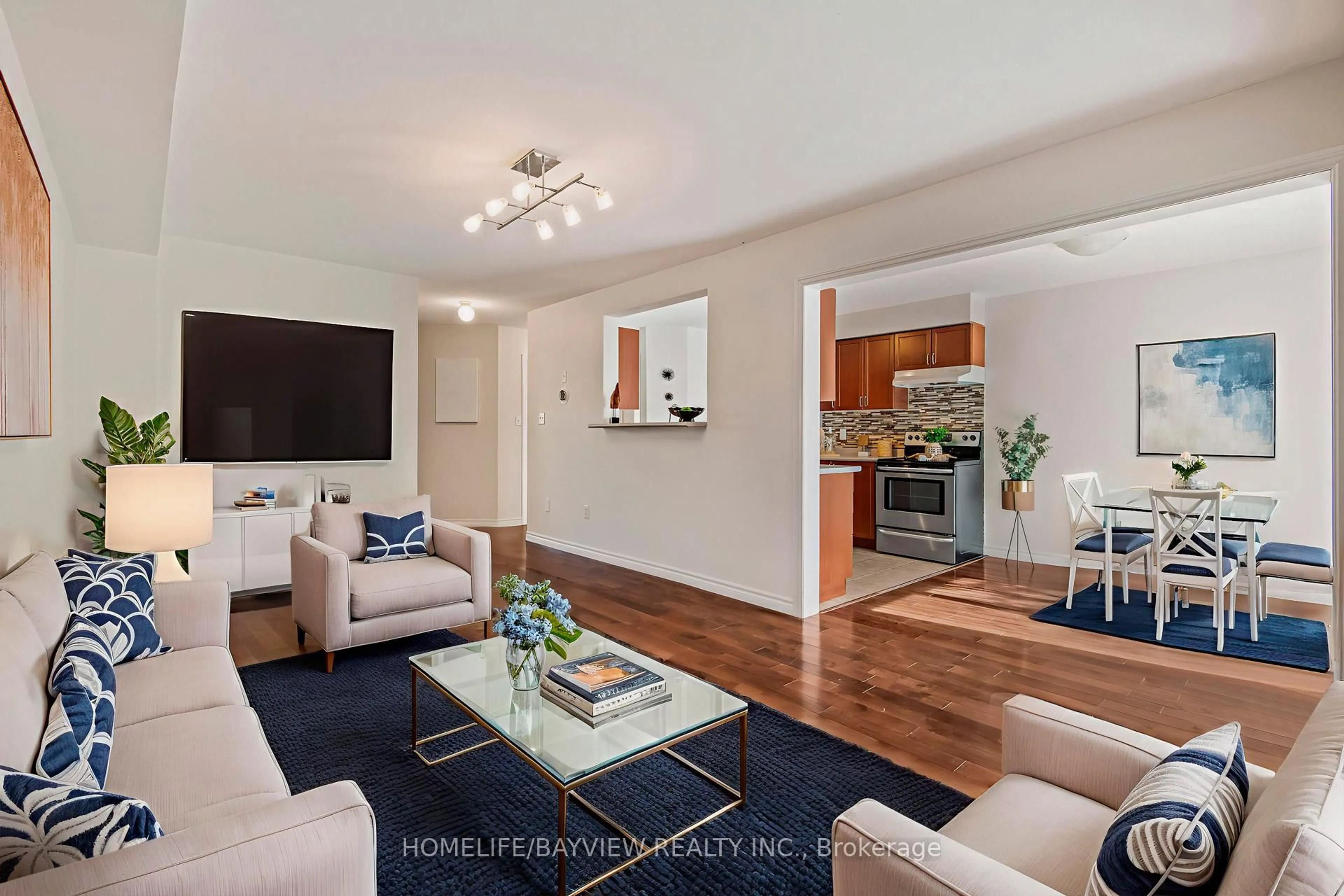 Living room with furniture, wood/laminate floor for 71 Shalom Way Dr, Barrie Ontario L4N 5Y3