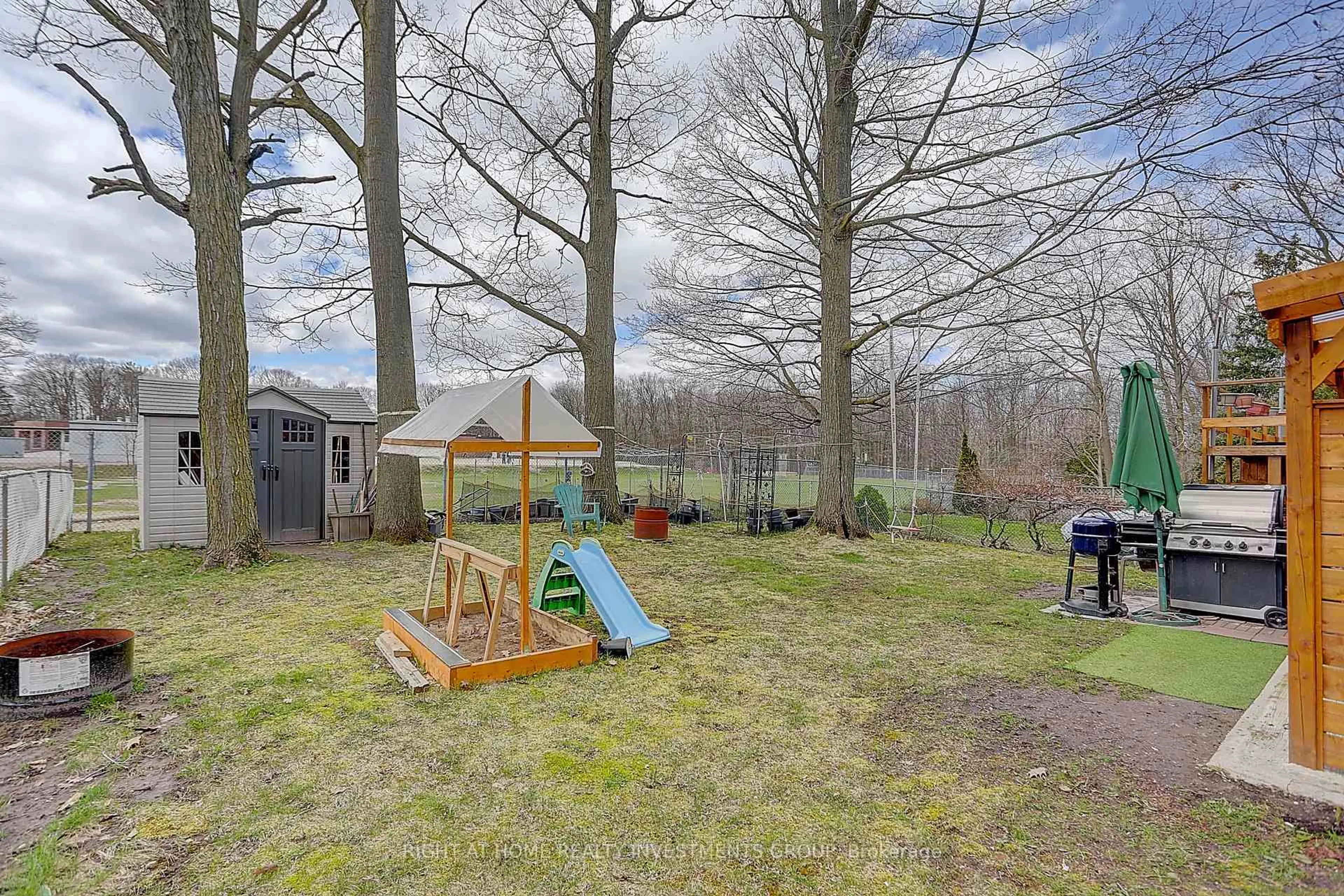 Patio, forest/trees view for 143 Springdale Dr, Barrie Ontario L4M 4Y1