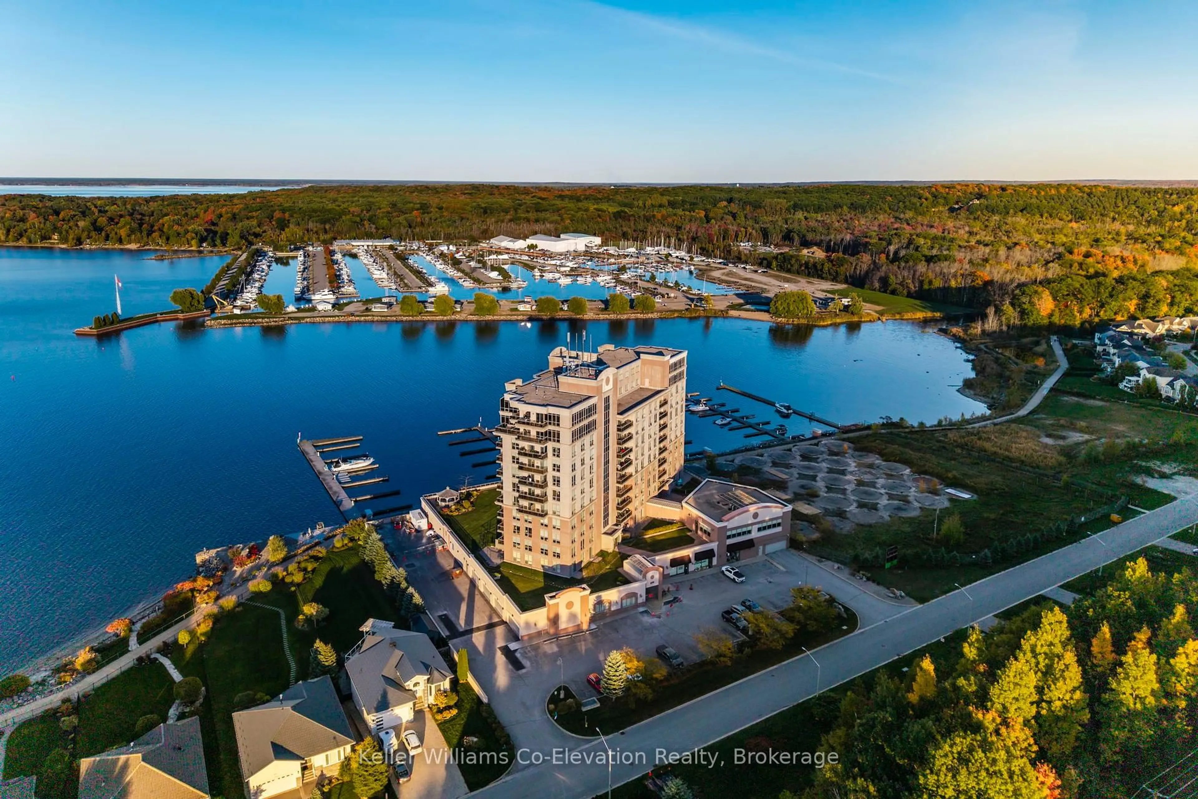 A pic from outside/outdoor area/front of a property/back of a property/a pic from drone, water/lake/river/ocean view for 699 Aberdeen Blvd #LPH01, Midland Ontario L4R 5P2