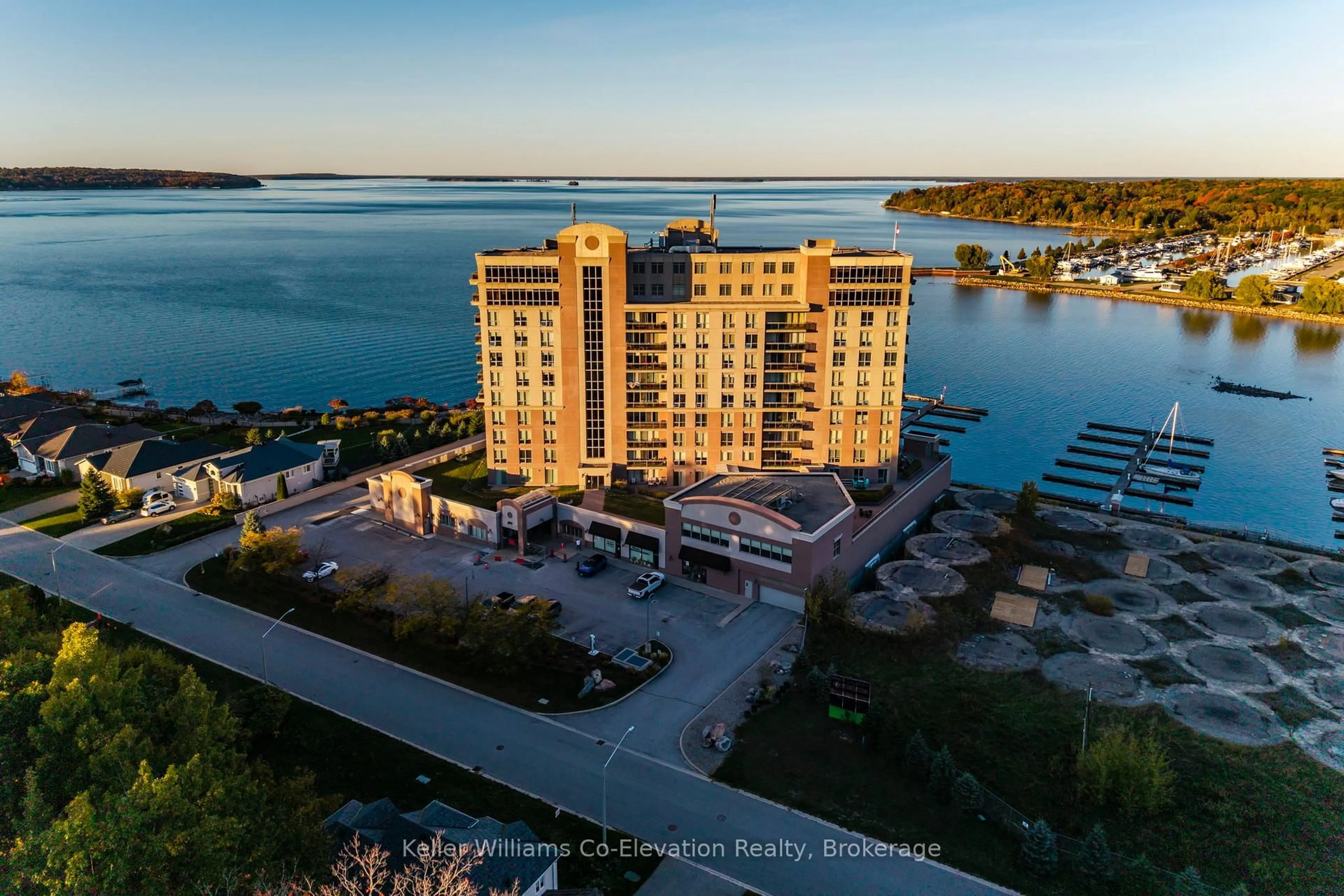 A pic from outside/outdoor area/front of a property/back of a property/a pic from drone, water/lake/river/ocean view for 699 Aberdeen Blvd #LPH01, Midland Ontario L4R 5P2