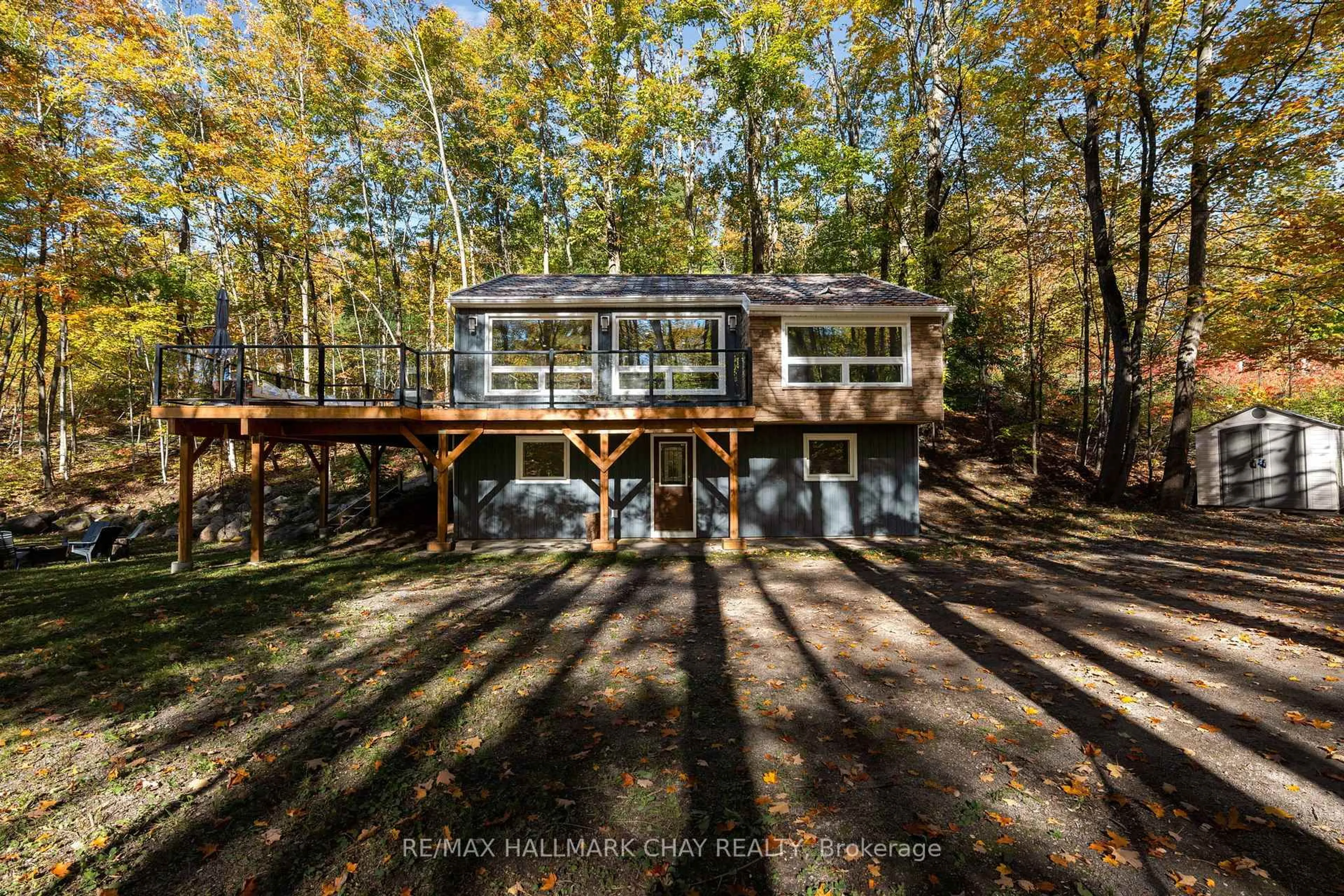 A pic from outside/outdoor area/front of a property/back of a property/a pic from drone, water/lake/river/ocean view for 1 Iroquois Rdge, Oro-Medonte Ontario L0K 1E0