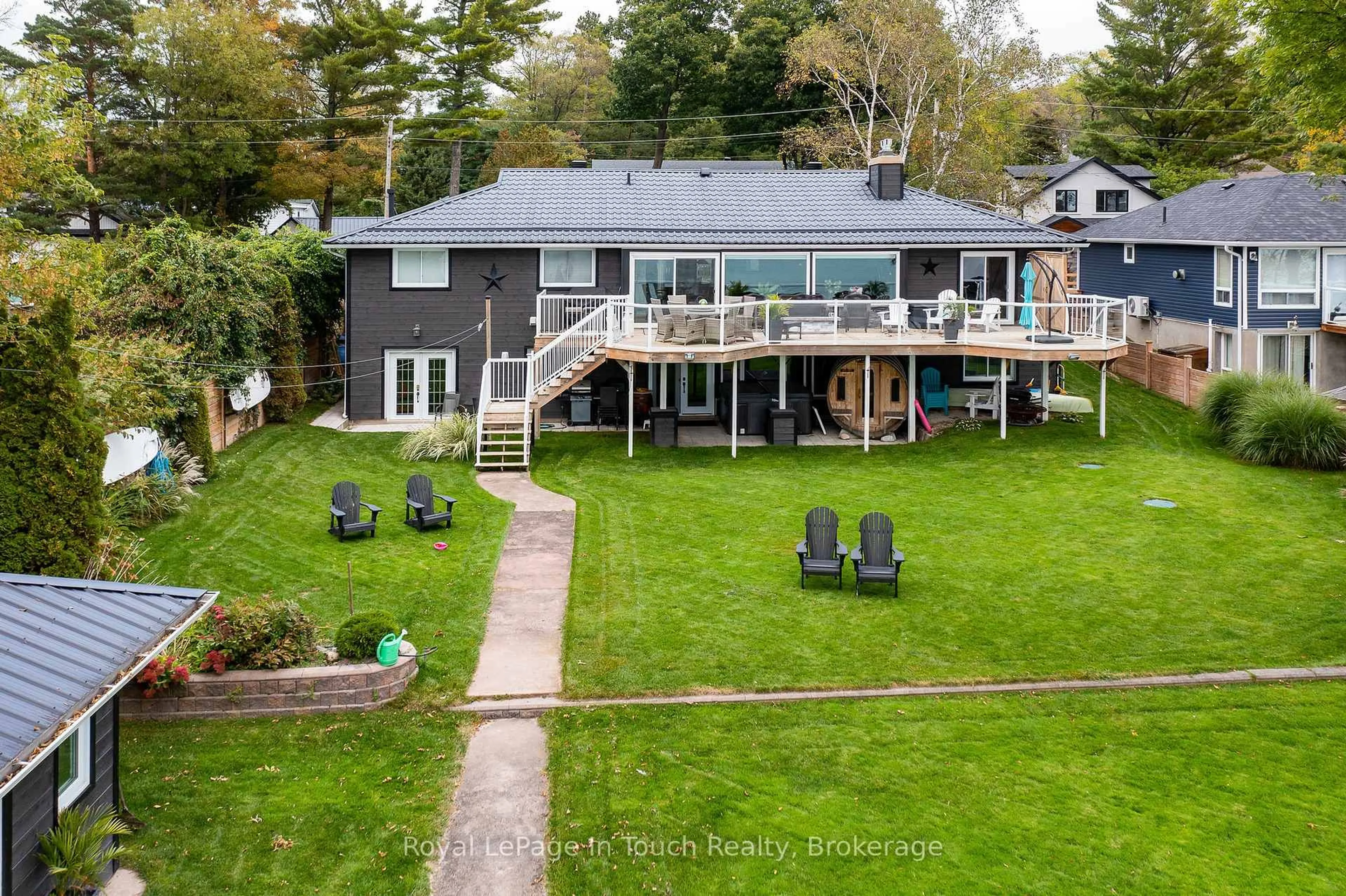 A pic from outside/outdoor area/front of a property/back of a property/a pic from drone, water/lake/river/ocean view for 8 TINY BEACHES Rd, Tiny Ontario L0L 2J0