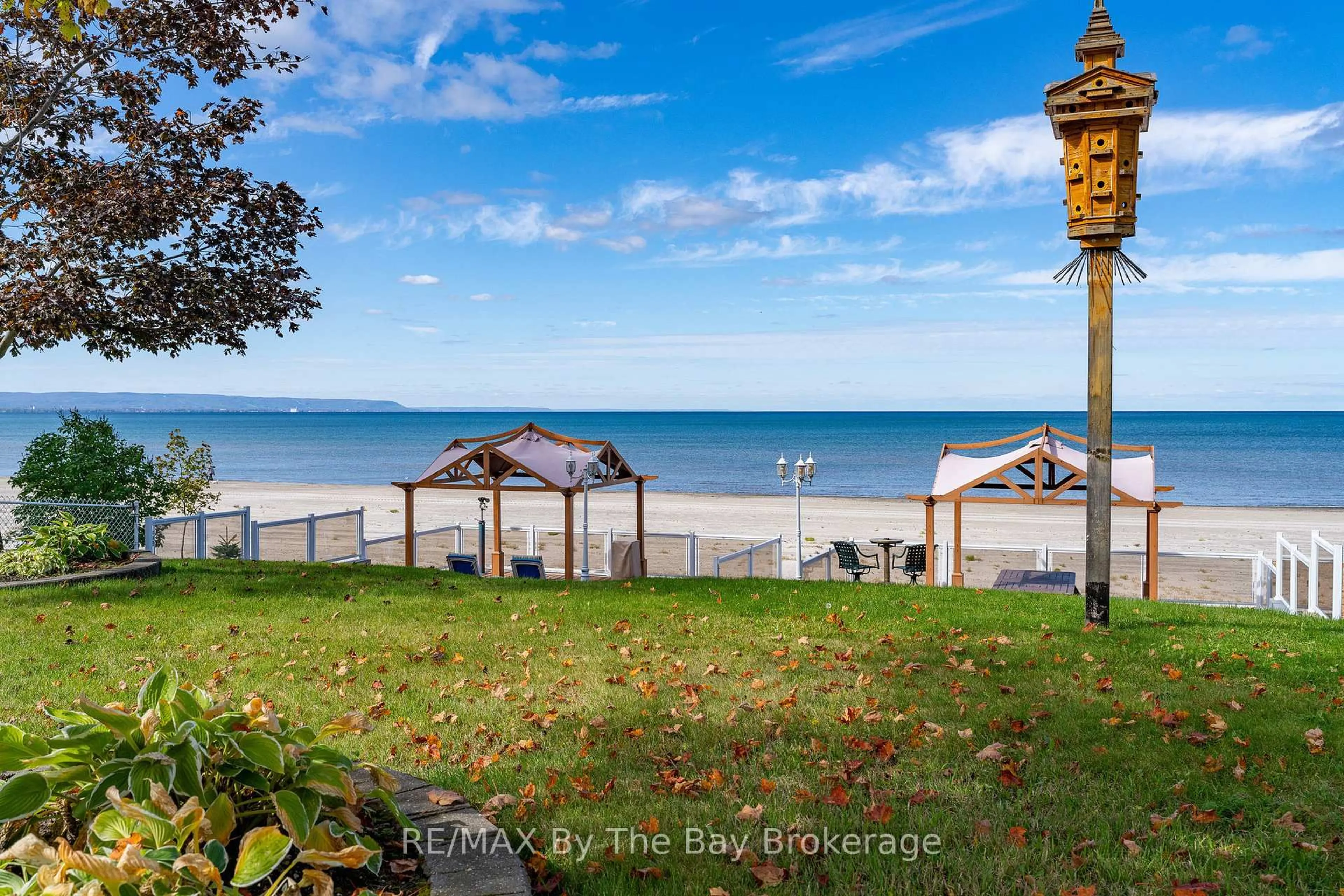 A pic from outside/outdoor area/front of a property/back of a property/a pic from drone, water/lake/river/ocean view for 108 Shore Lane, Wasaga Beach Ontario L9Z 2J6