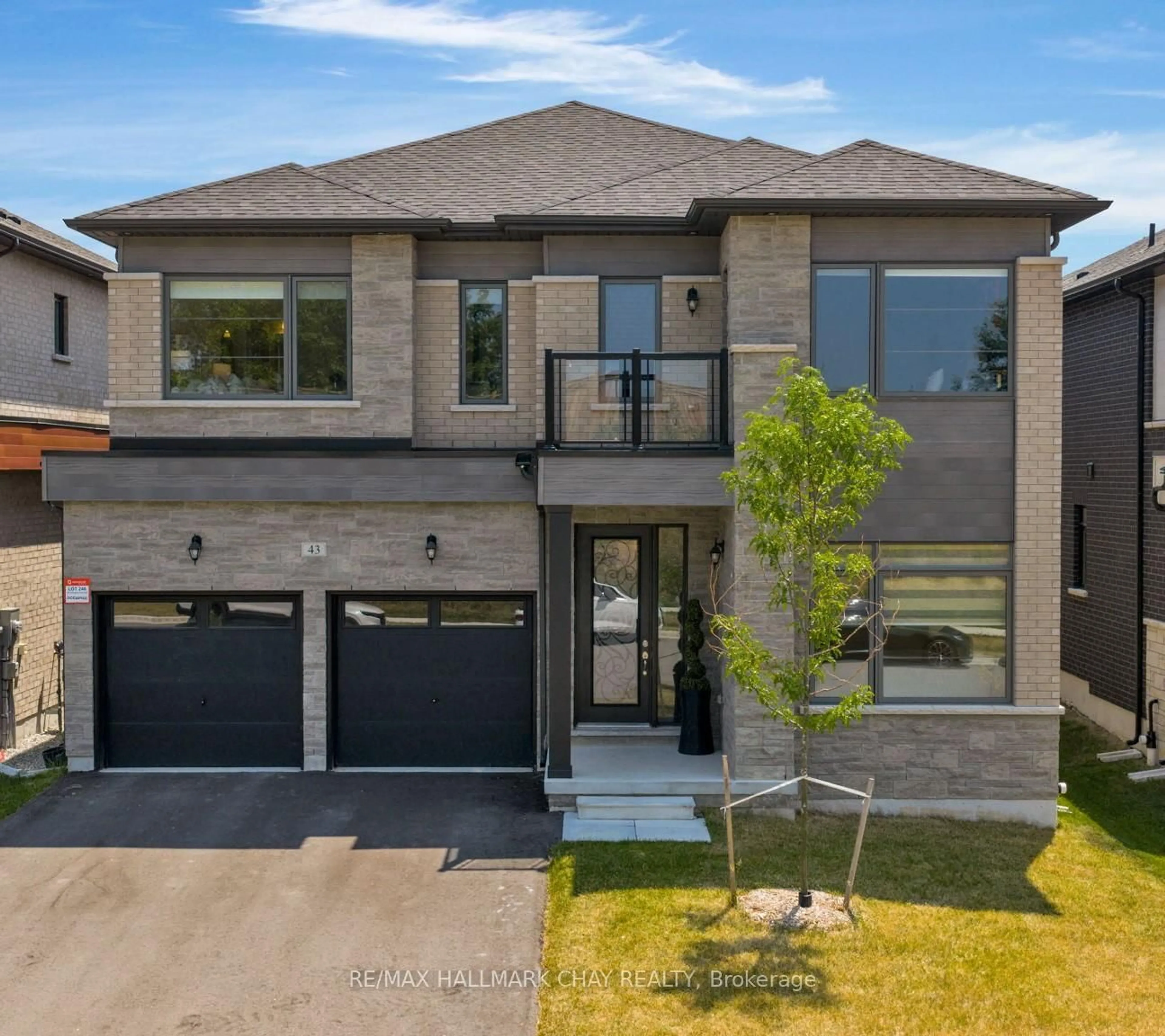 Home with brick exterior material, street for 43 Calypso Ave, Springwater Ontario L0L 1Y3