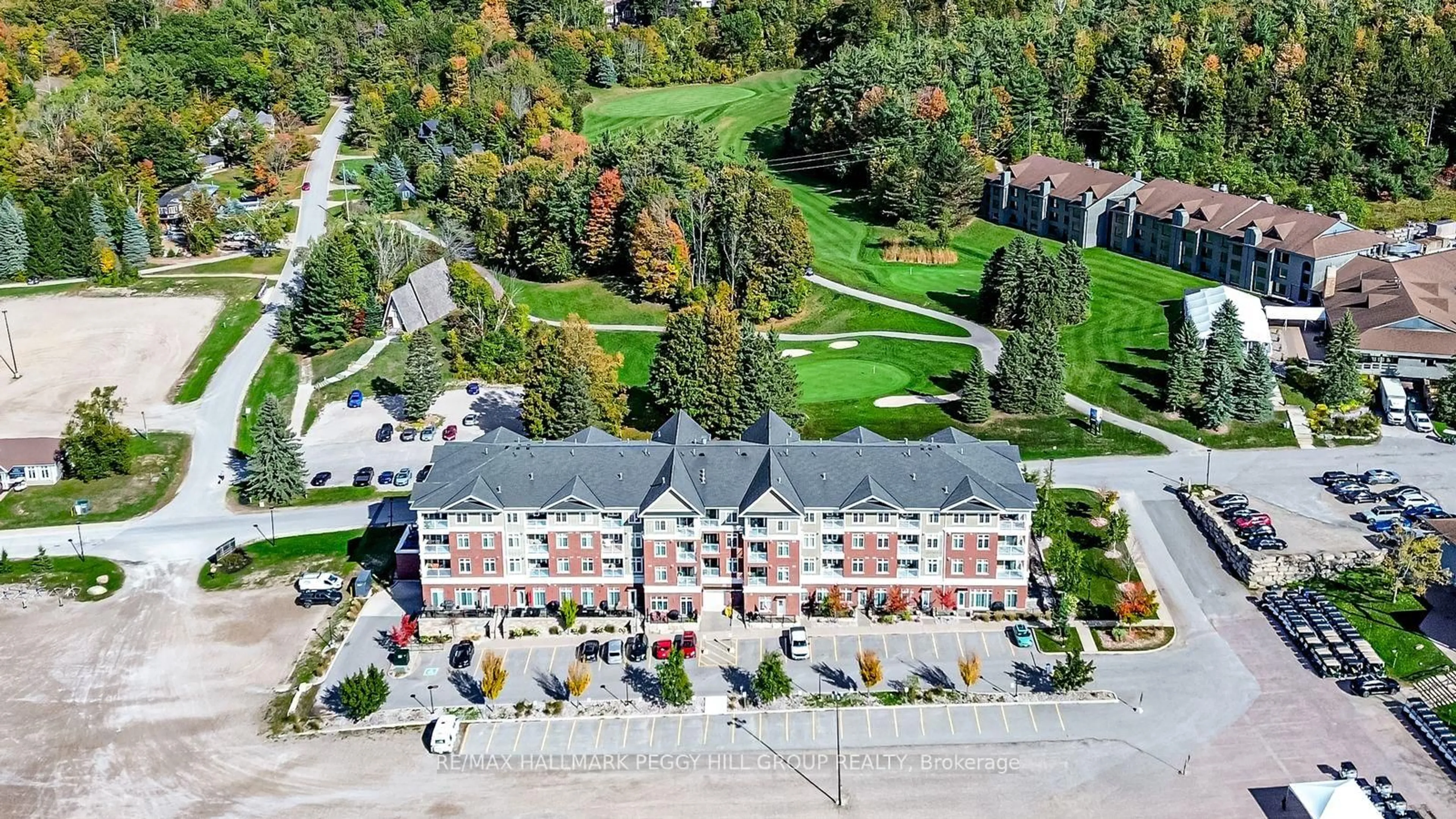 A pic from outside/outdoor area/front of a property/back of a property/a pic from drone, unknown for 40 Horseshoe Blvd #217, Oro-Medonte Ontario L4M 4Y8