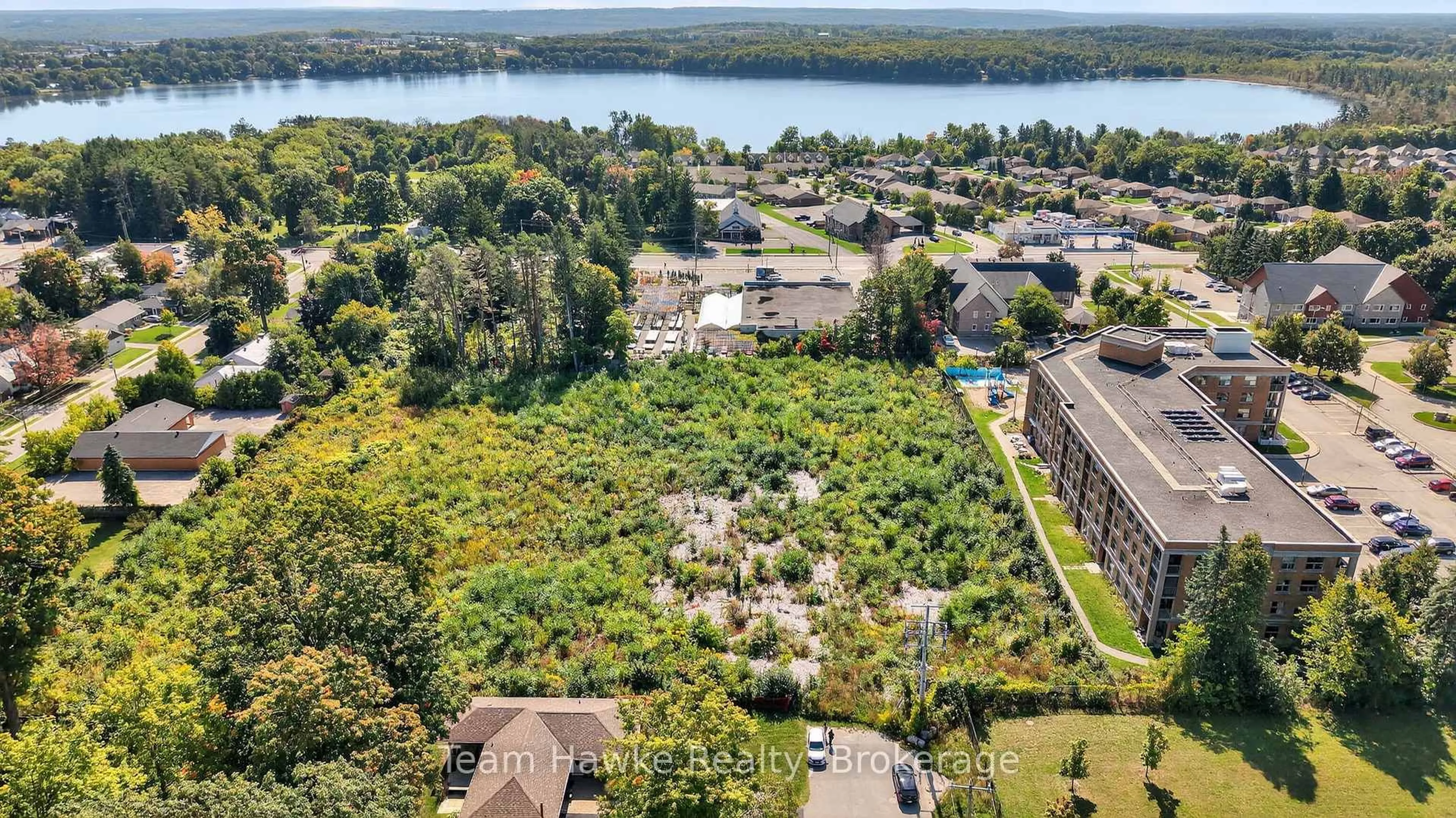 A pic from outside/outdoor area/front of a property/back of a property/a pic from drone, water/lake/river/ocean view for 319 Gervais St #Lot 3, Midland Ontario L4R 4C6
