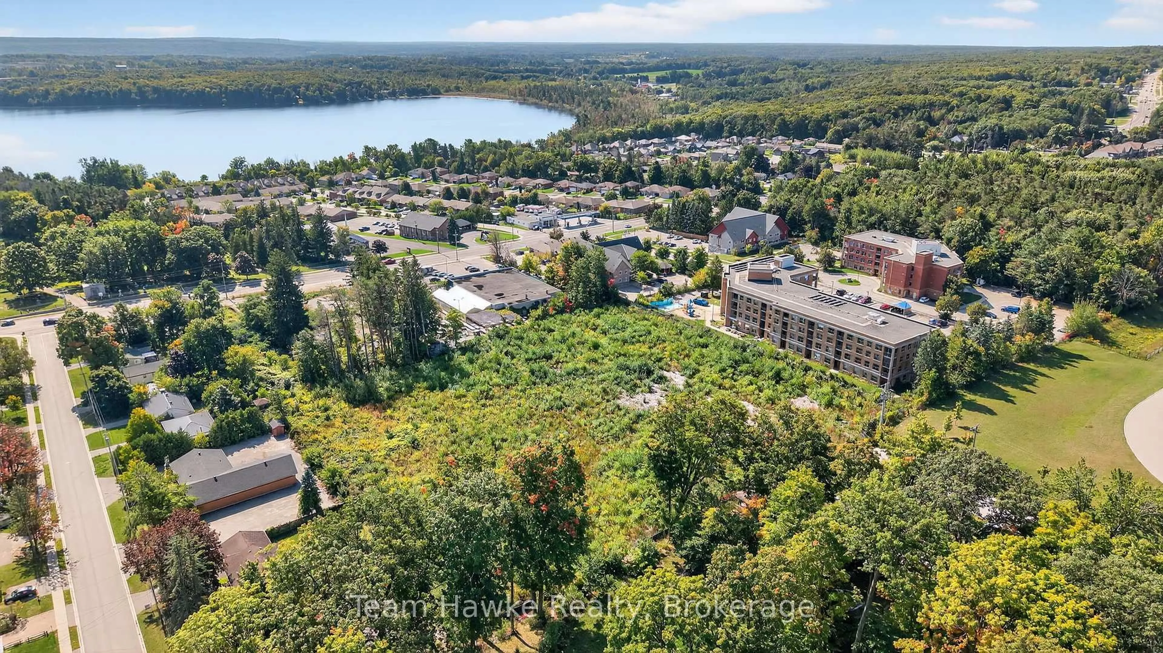 A pic from outside/outdoor area/front of a property/back of a property/a pic from drone, water/lake/river/ocean view for 319 Gervais St #Lot 3, Midland Ontario L4R 4C6