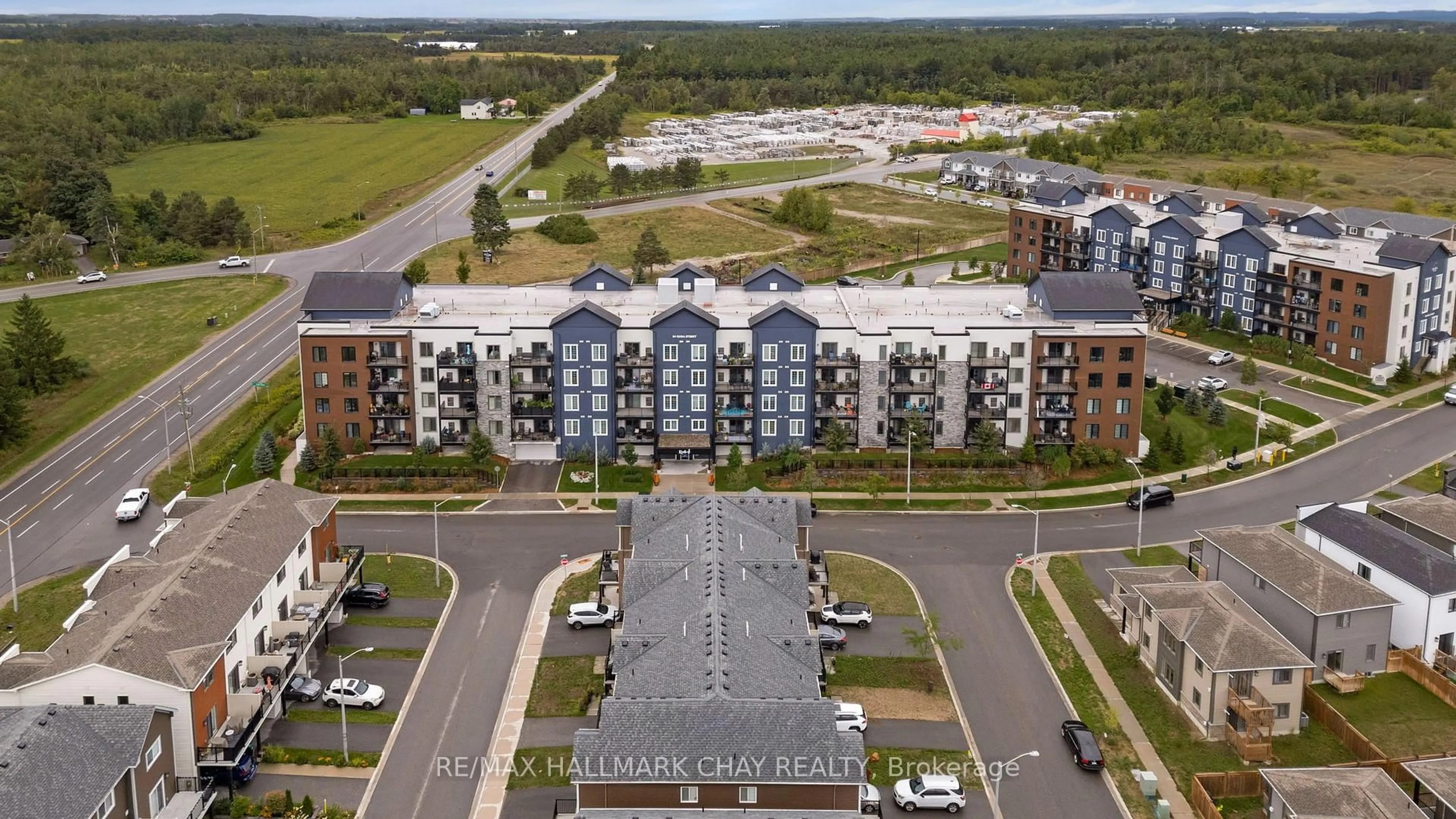 A pic from outside/outdoor area/front of a property/back of a property/a pic from drone, unknown for 54 Koda St #301, Barrie Ontario L9J 0J6