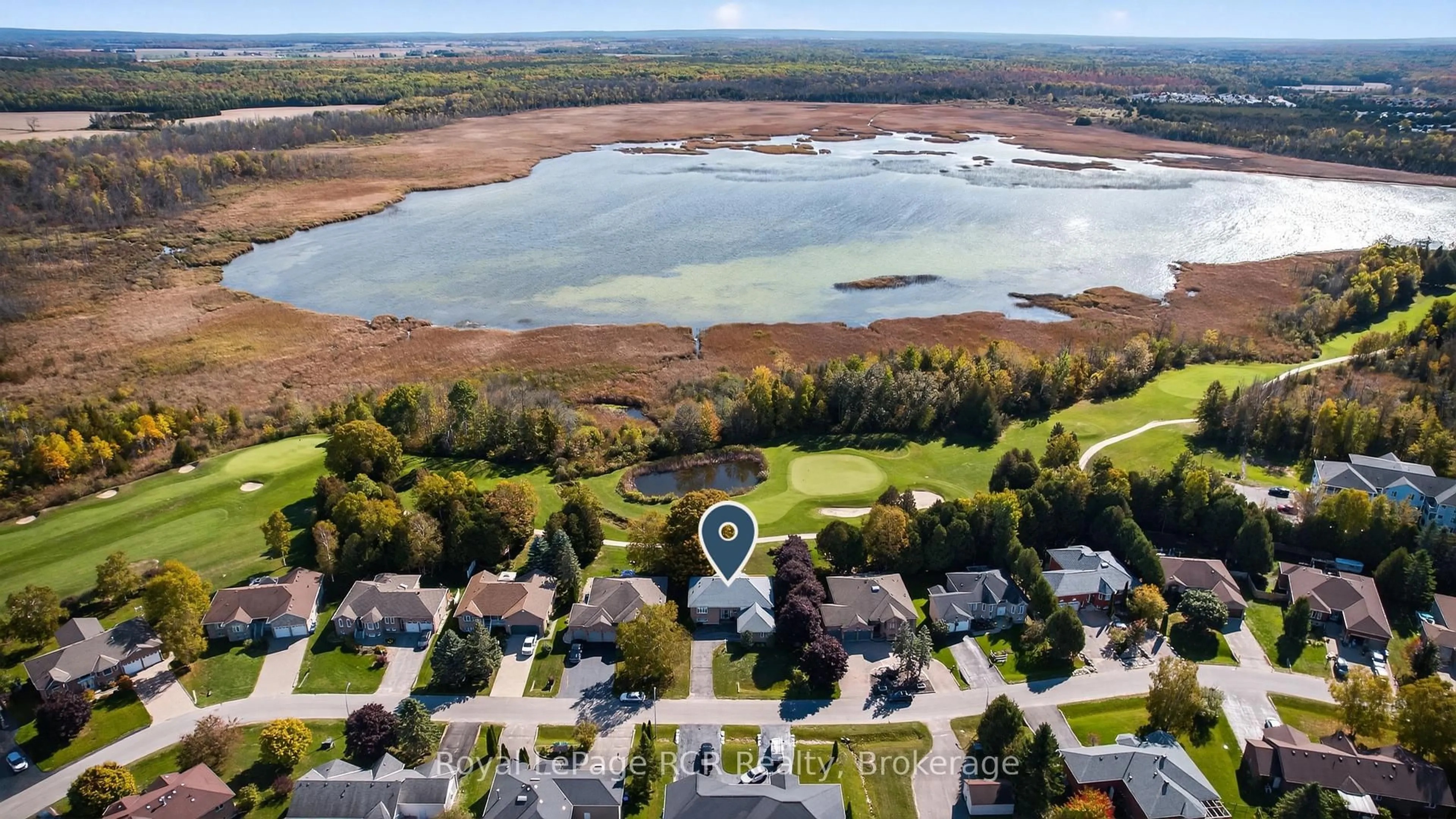 A pic from outside/outdoor area/front of a property/back of a property/a pic from drone, water/lake/river/ocean view for 68 Fairway Cres, Wasaga Beach Ontario L9Z 1B8