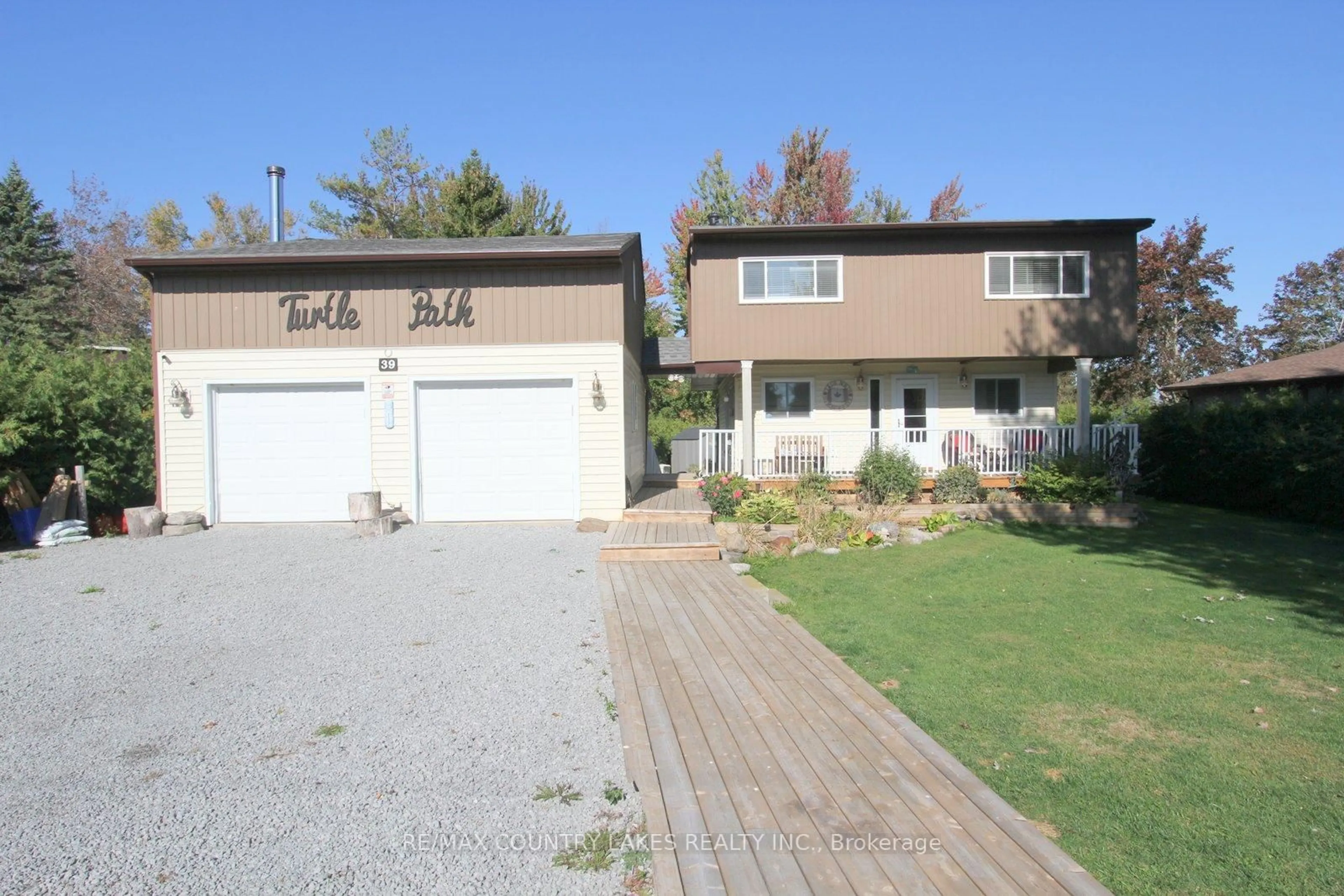Home with vinyl exterior material, street for 39 Turtle Path, Ramara Ontario L0K 1B0