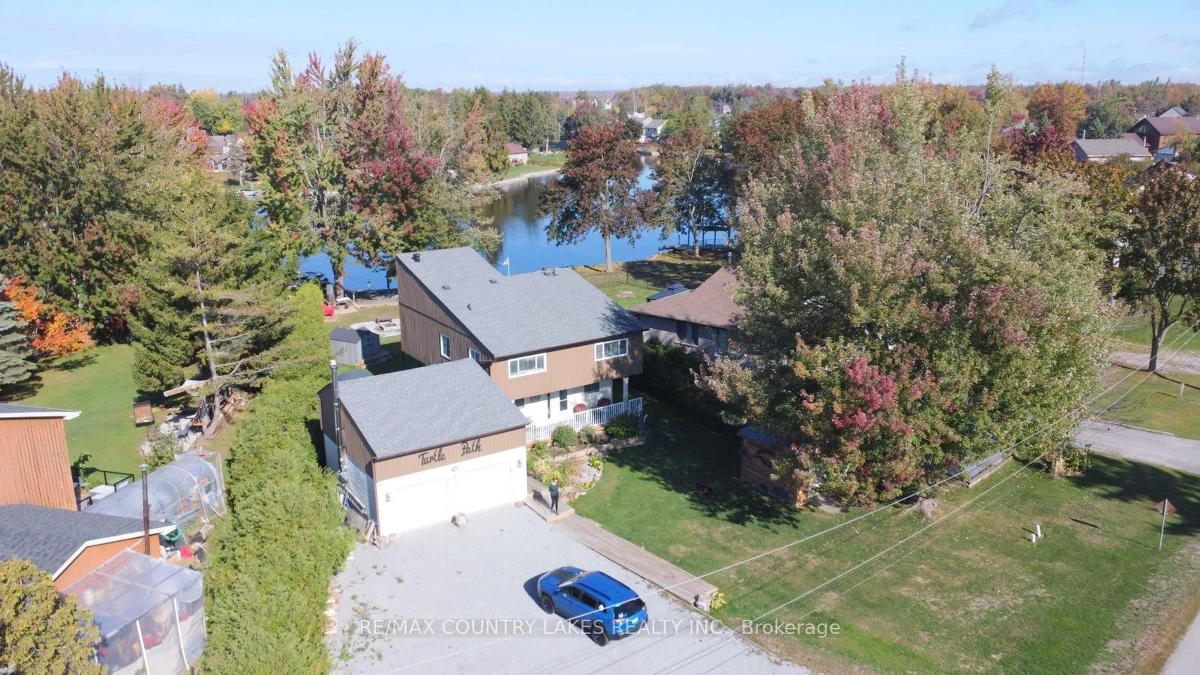 A pic from outside/outdoor area/front of a property/back of a property/a pic from drone, water/lake/river/ocean view for 39 Turtle Path, Ramara Ontario L0K 1B0