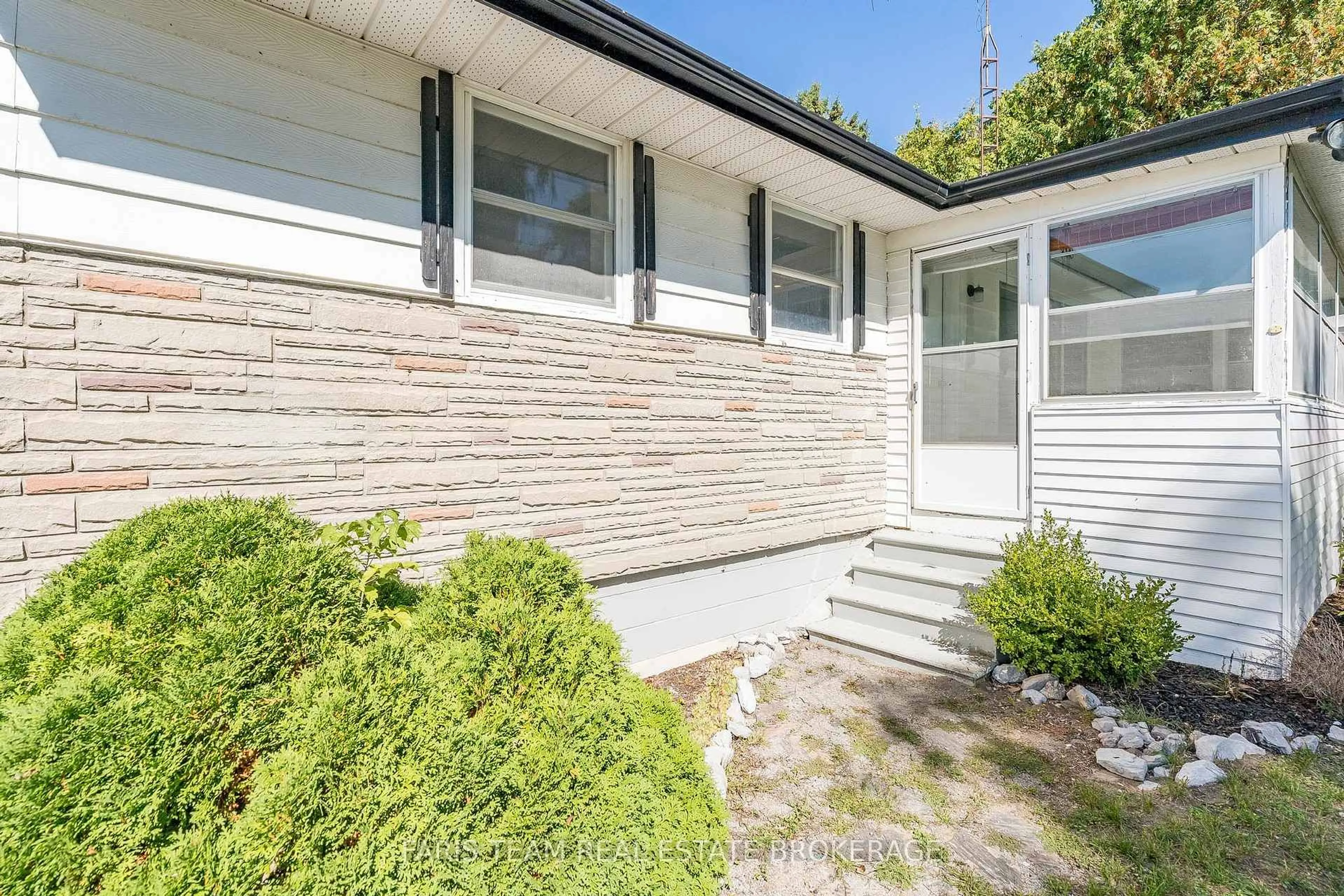 Home with vinyl exterior material, street for 2570 Sunnidale Rd, Springwater Ontario L0M 1T2