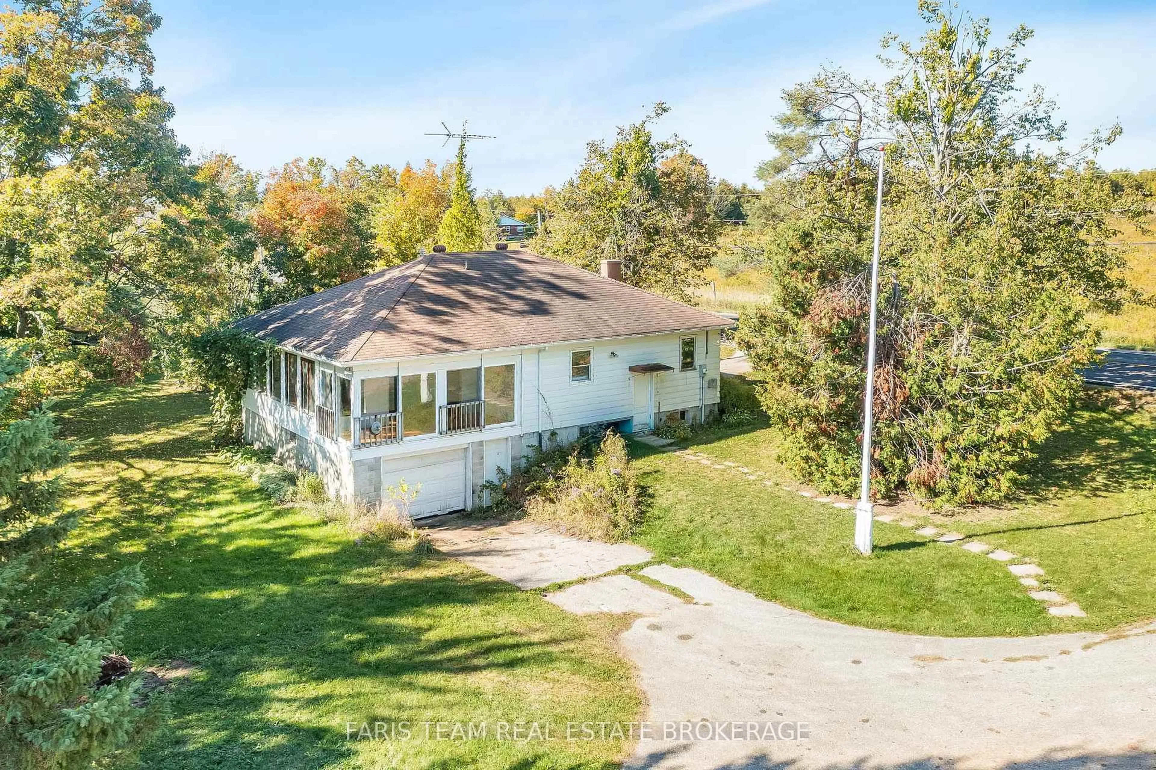 A pic from outside/outdoor area/front of a property/back of a property/a pic from drone, unknown for 201 Ridge Rd, Oro-Medonte Ontario L0L 2E0