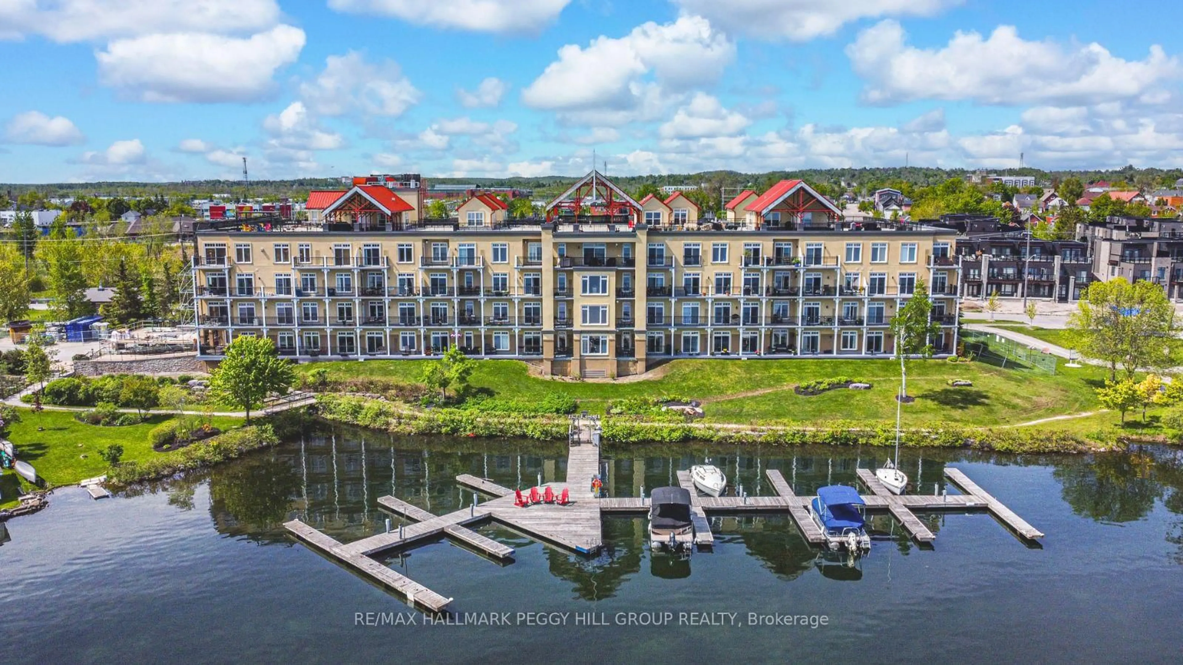 A pic from outside/outdoor area/front of a property/back of a property/a pic from drone, water/lake/river/ocean view for 140 Cedar Island Rd #401, Orillia Ontario L3V 1T1