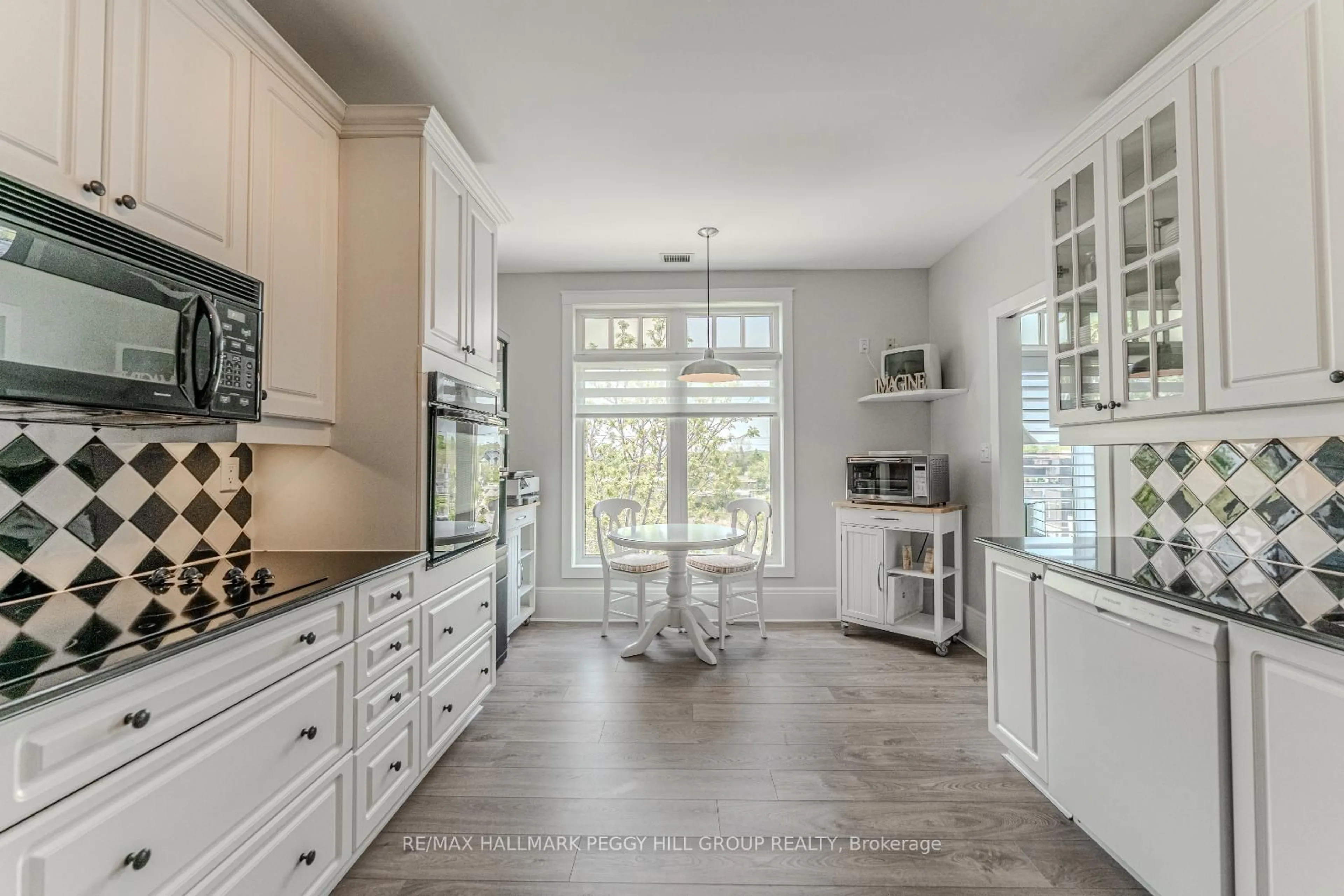 Open concept kitchen, ceramic/tile floor for 140 Cedar Island Rd #401, Orillia Ontario L3V 1T1