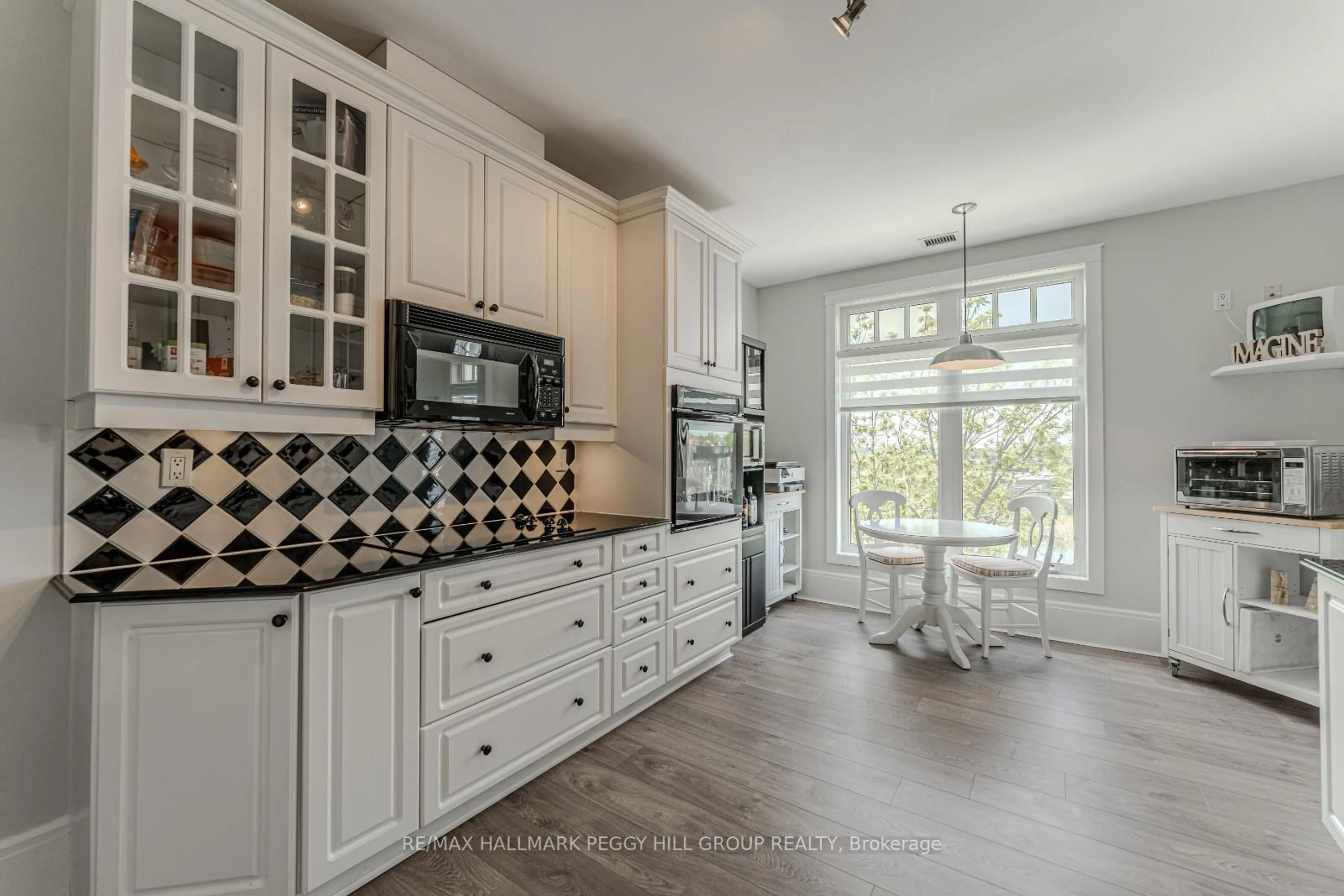 Open concept kitchen, ceramic/tile floor for 140 Cedar Island Rd #401, Orillia Ontario L3V 1T1