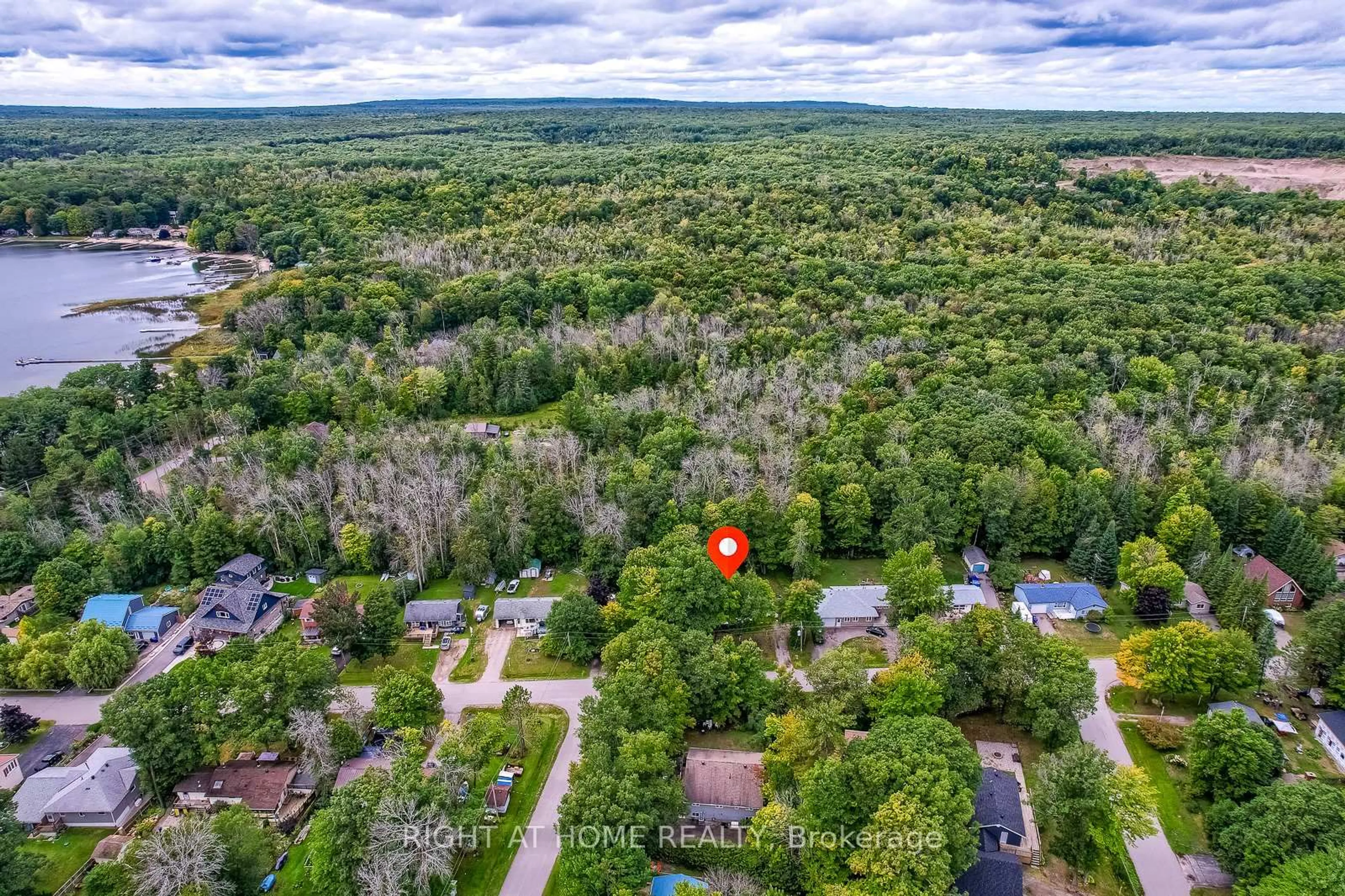 A pic from outside/outdoor area/front of a property/back of a property/a pic from drone, forest/trees view for 29 NIDA Dr, Tiny Ontario L9M 0B3