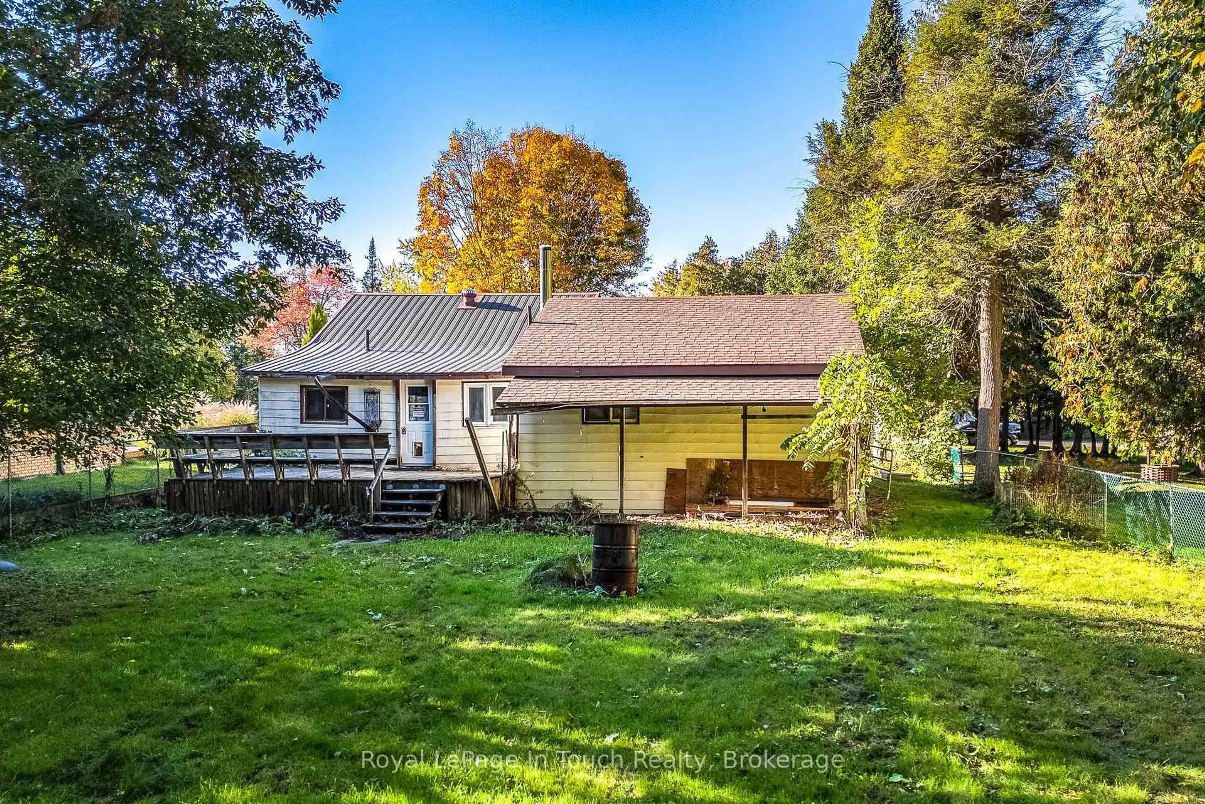 A pic from outside/outdoor area/front of a property/back of a property/a pic from drone, forest/trees view for 77 King Rd, Tay Ontario L0K 2C0