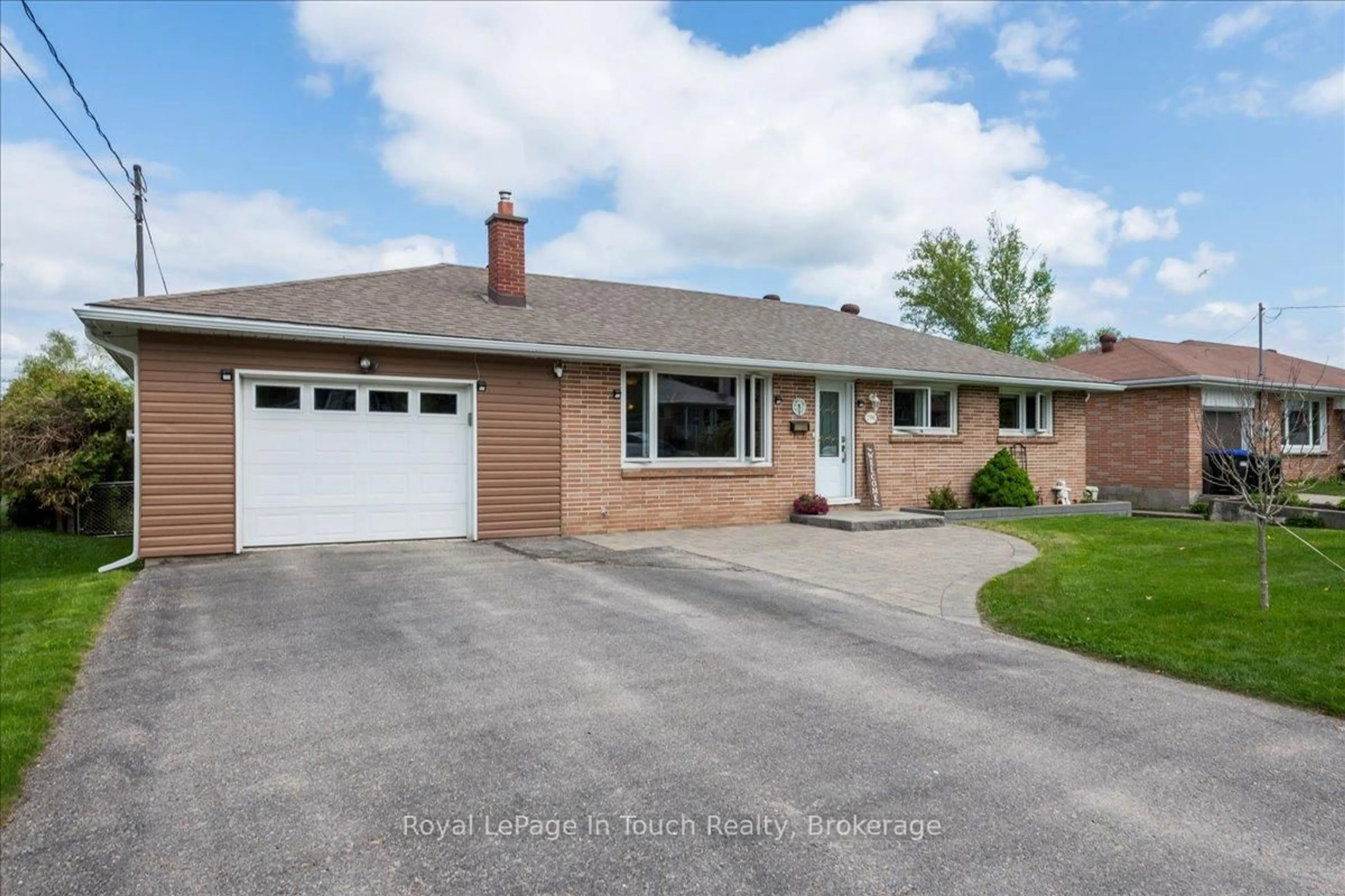 Home with brick exterior material, street for 296 John St, Midland Ontario L4R 2J5