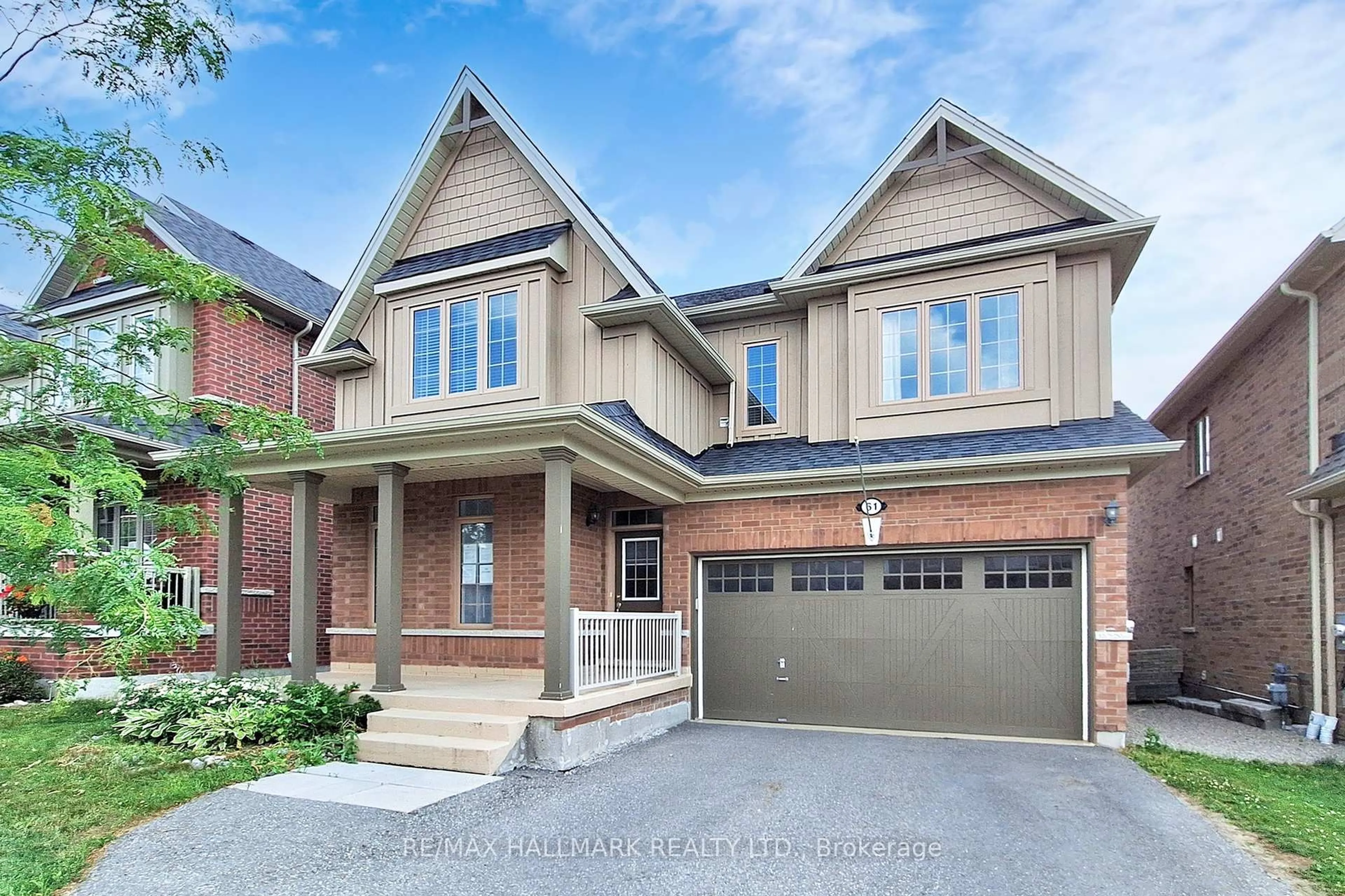 Home with brick exterior material, street for 61 McIsaac Dr, Springwater Ontario L4M 4S4