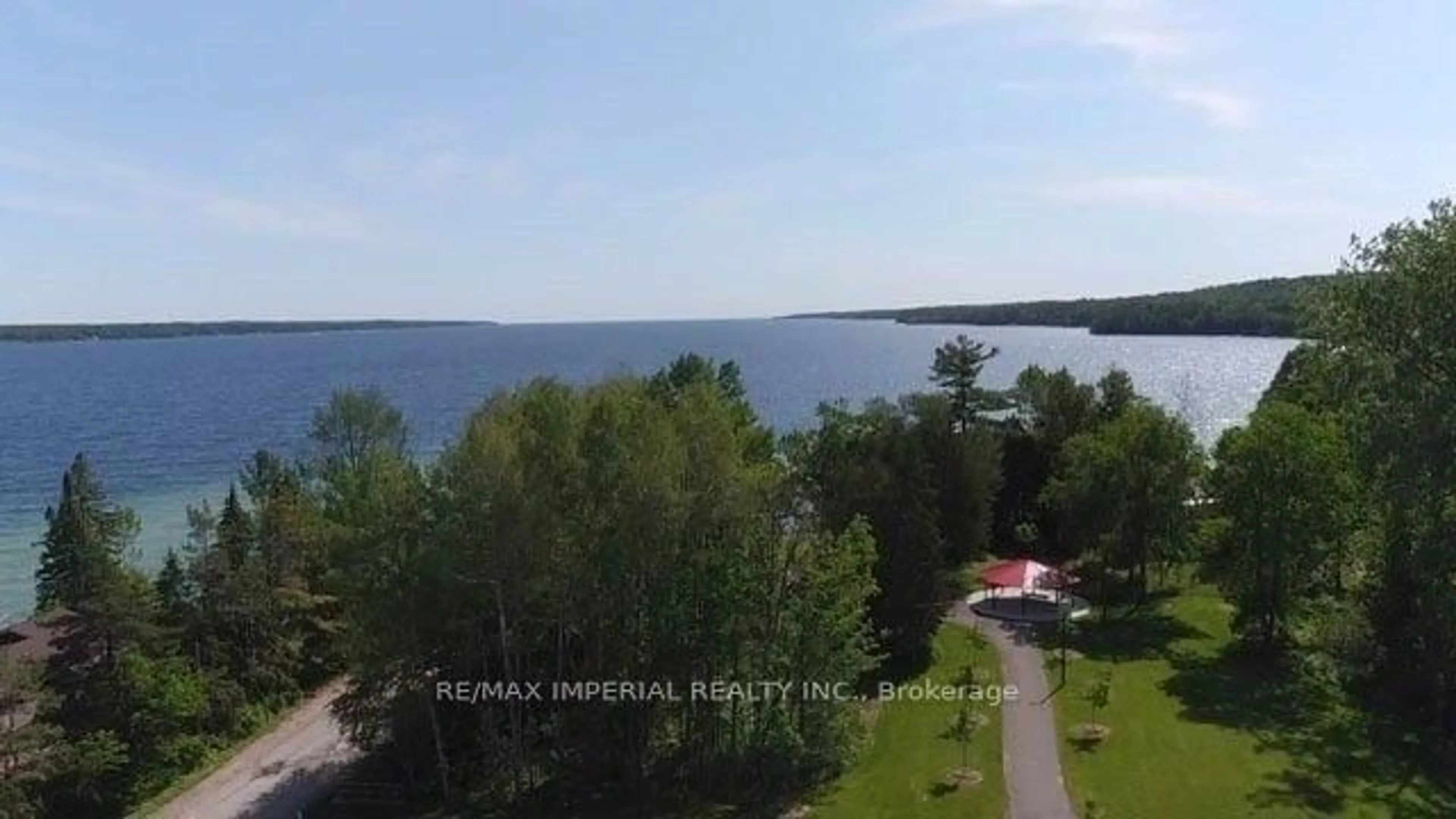 A pic from outside/outdoor area/front of a property/back of a property/a pic from drone, water/lake/river/ocean view for 4 Plunkett Crt, Barrie Ontario L4N 6M3